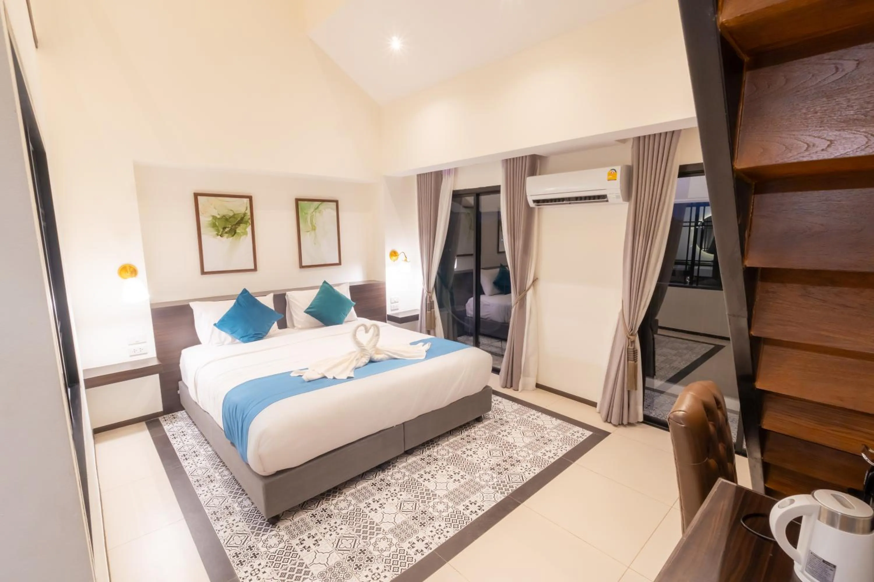 Bed in Le ville lanna Chiang Mai Gate Old Town Hotel