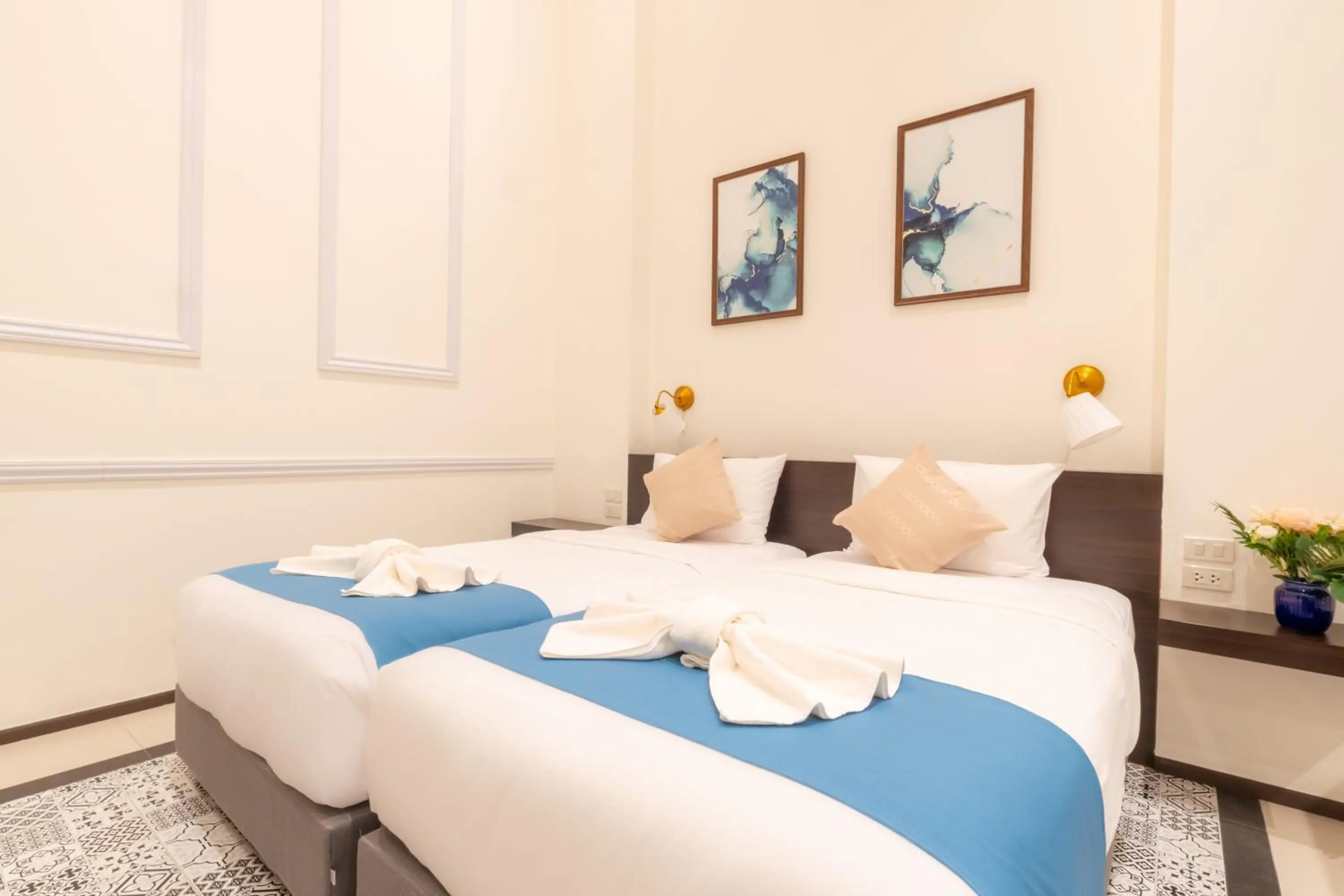 Bed in Le ville lanna Chiang Mai Gate Old Town Hotel