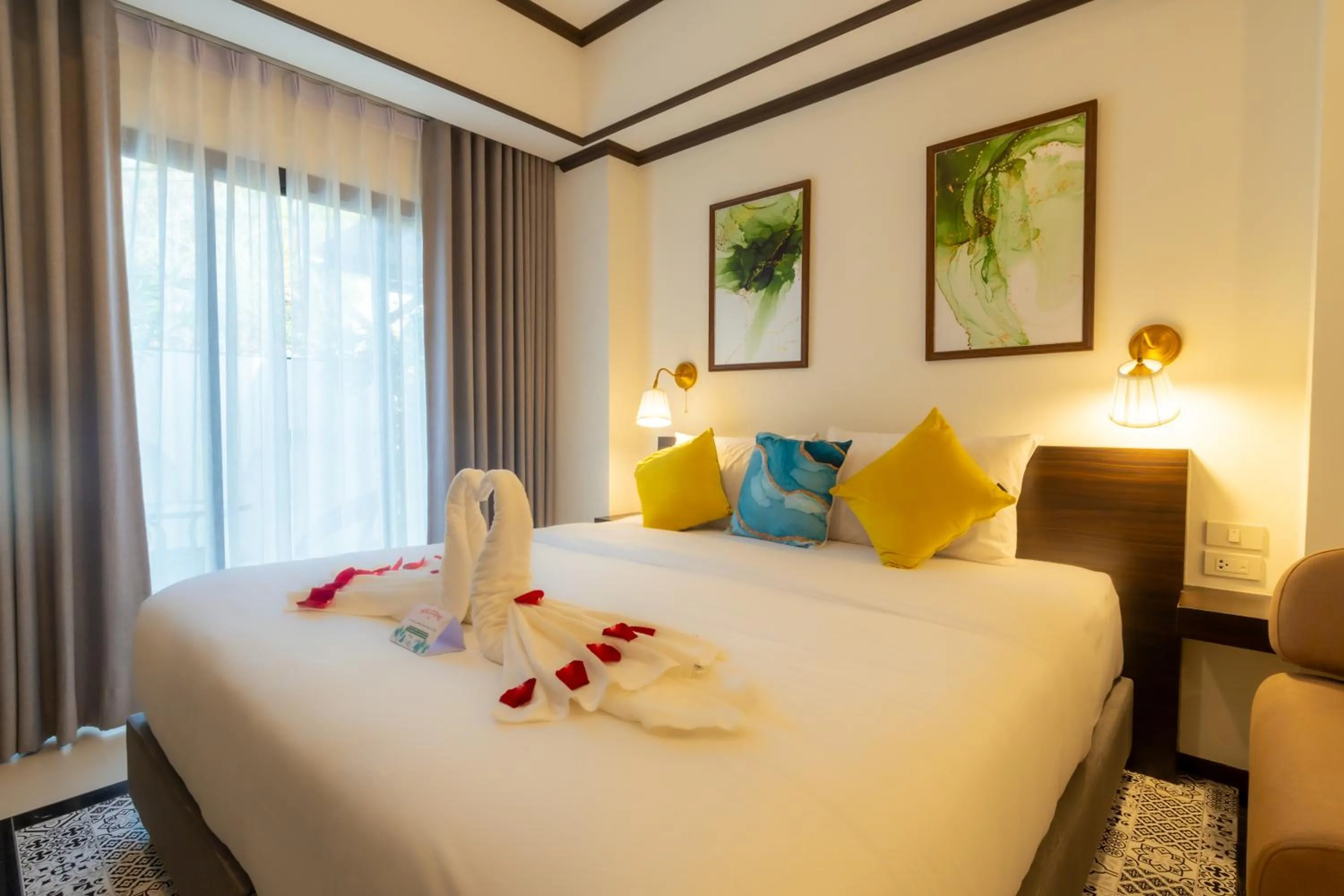 Bed in Le ville lanna Chiang Mai Gate Old Town Hotel