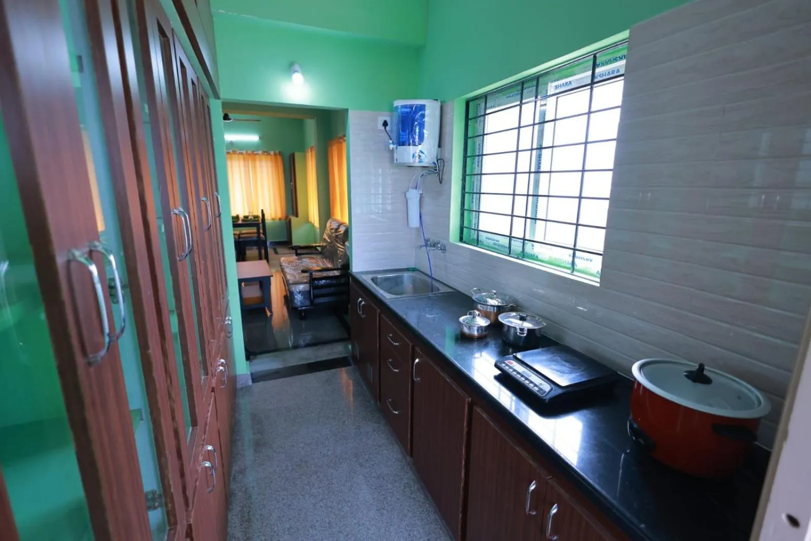 Kitchen or kitchenette in Aditya Homestay