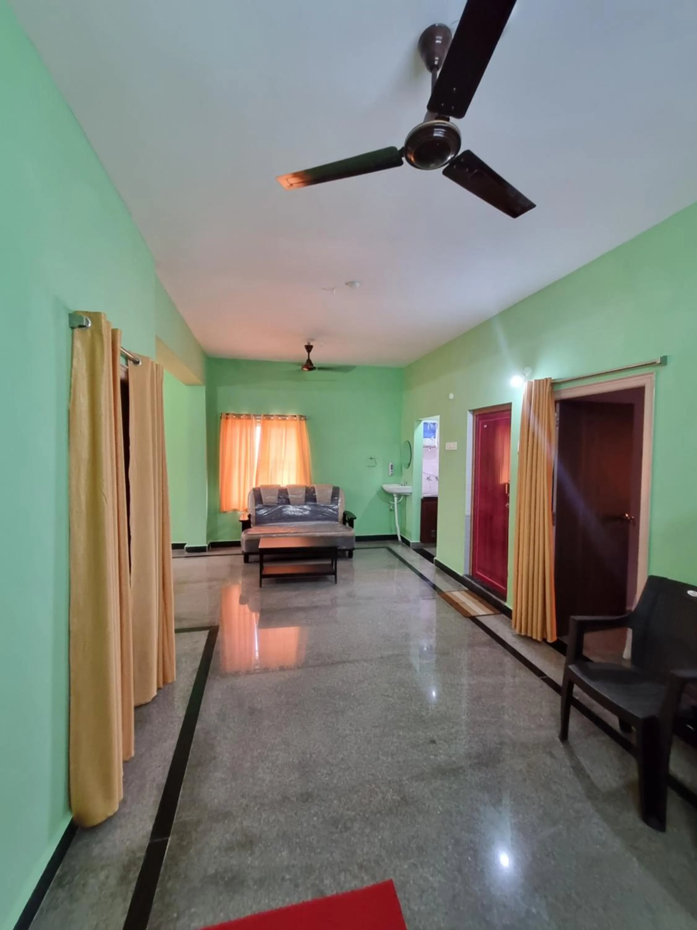 Living room in Aditya Homestay