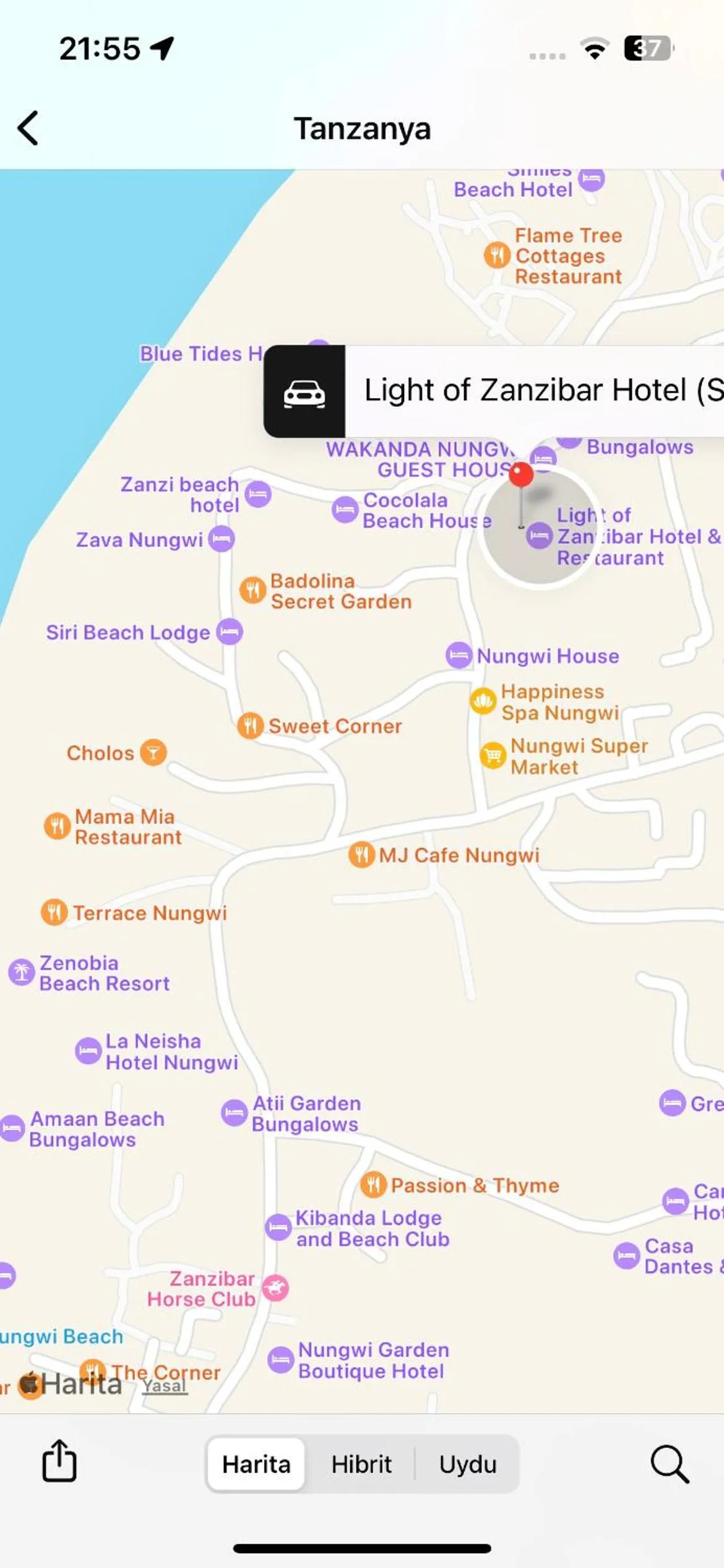 Text overlay in Light of Zanzibar Hotel