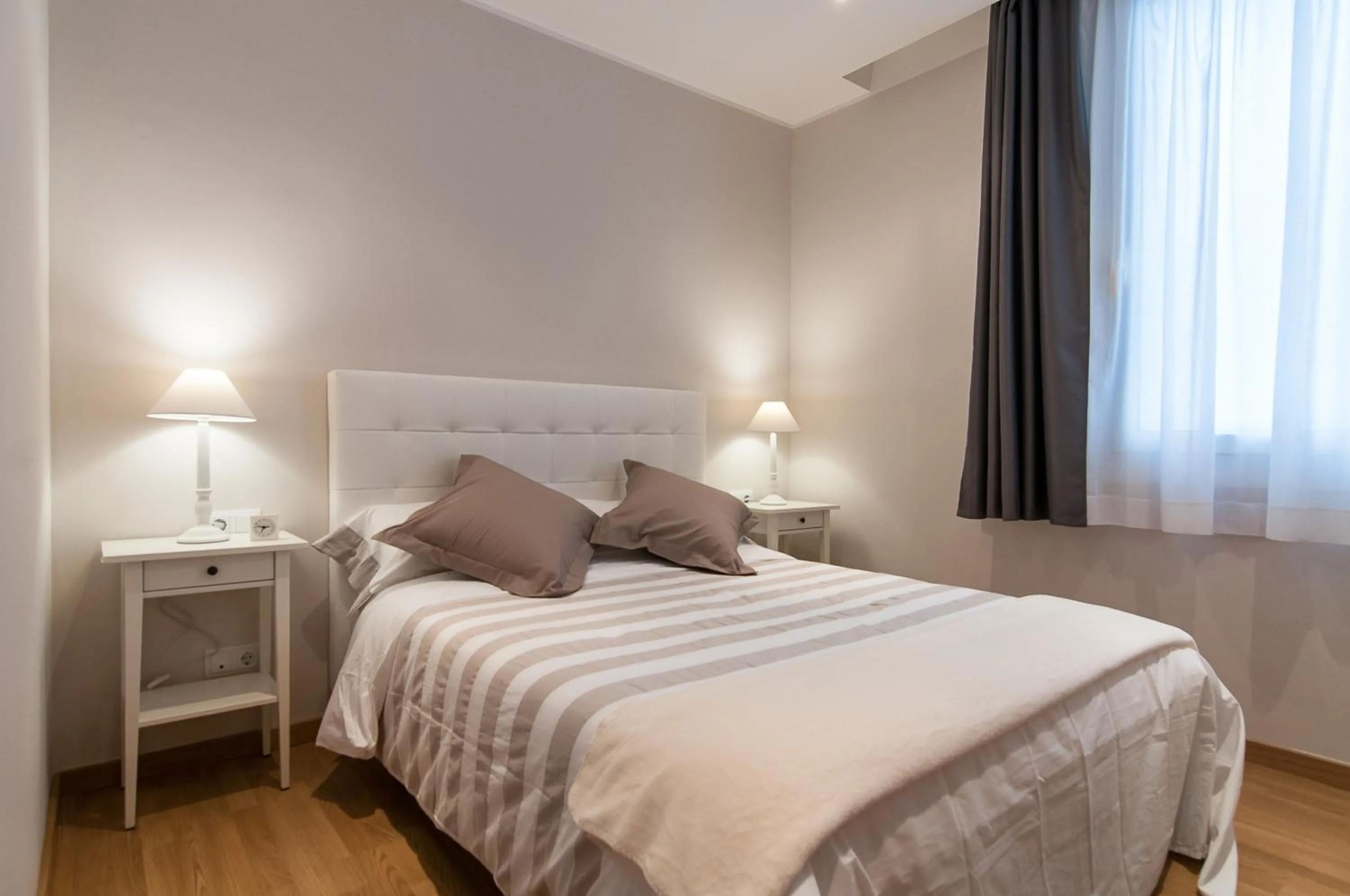 Bedroom, Bed in Pelayo Deluxe Apartments