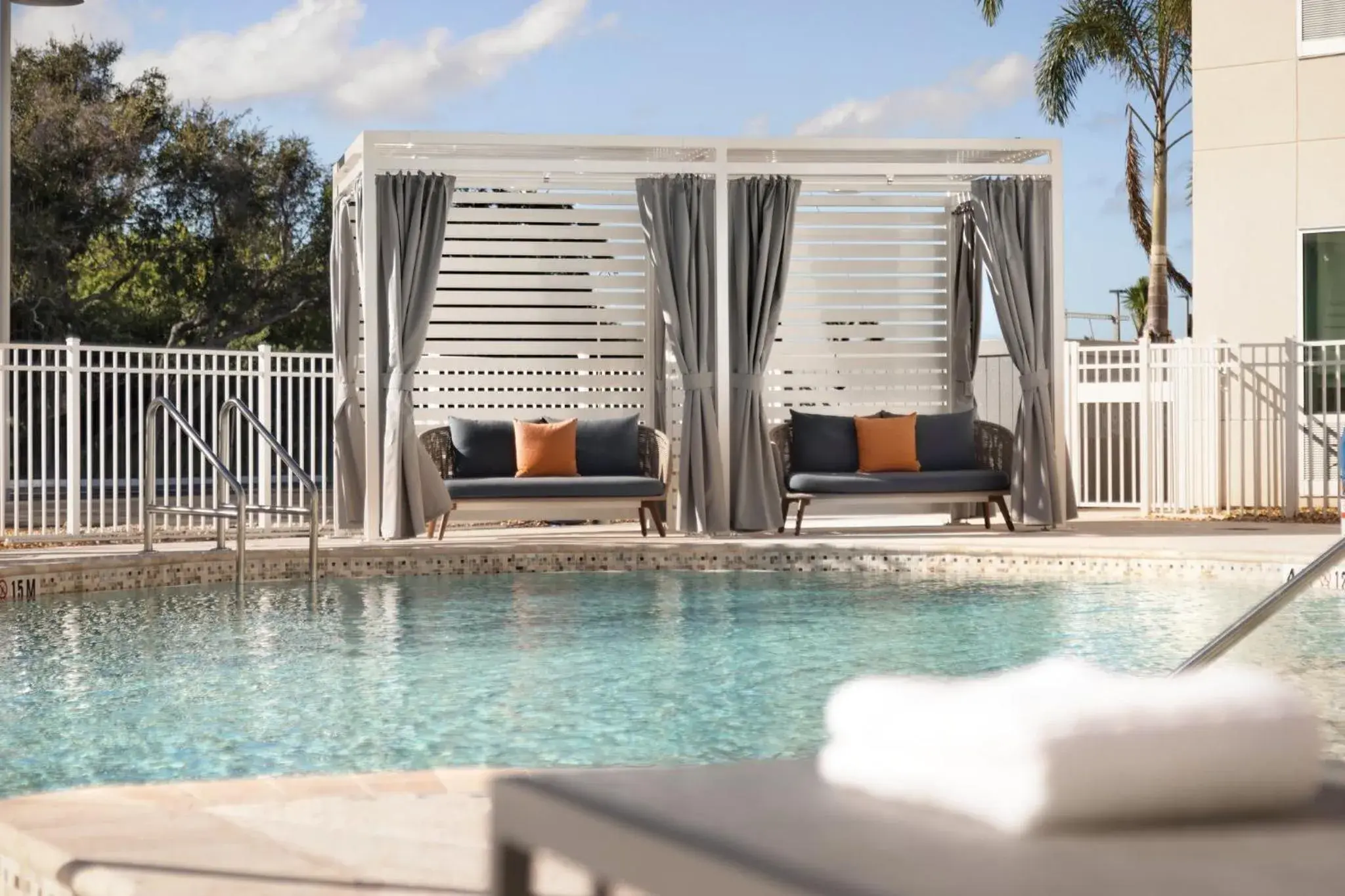 Swimming Pool in Holiday Inn Express Cape Canaveral, an IHG Hotel