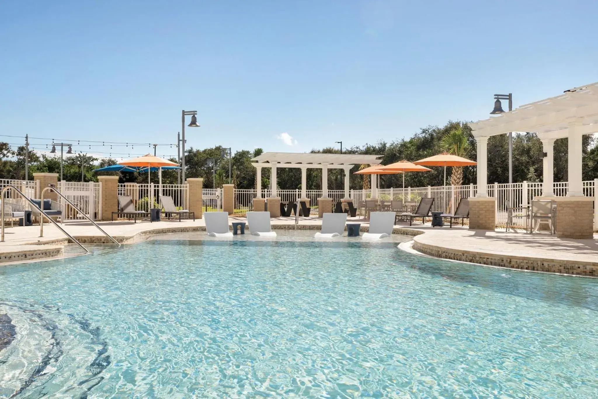 Swimming Pool in Holiday Inn Express Cape Canaveral, an IHG Hotel