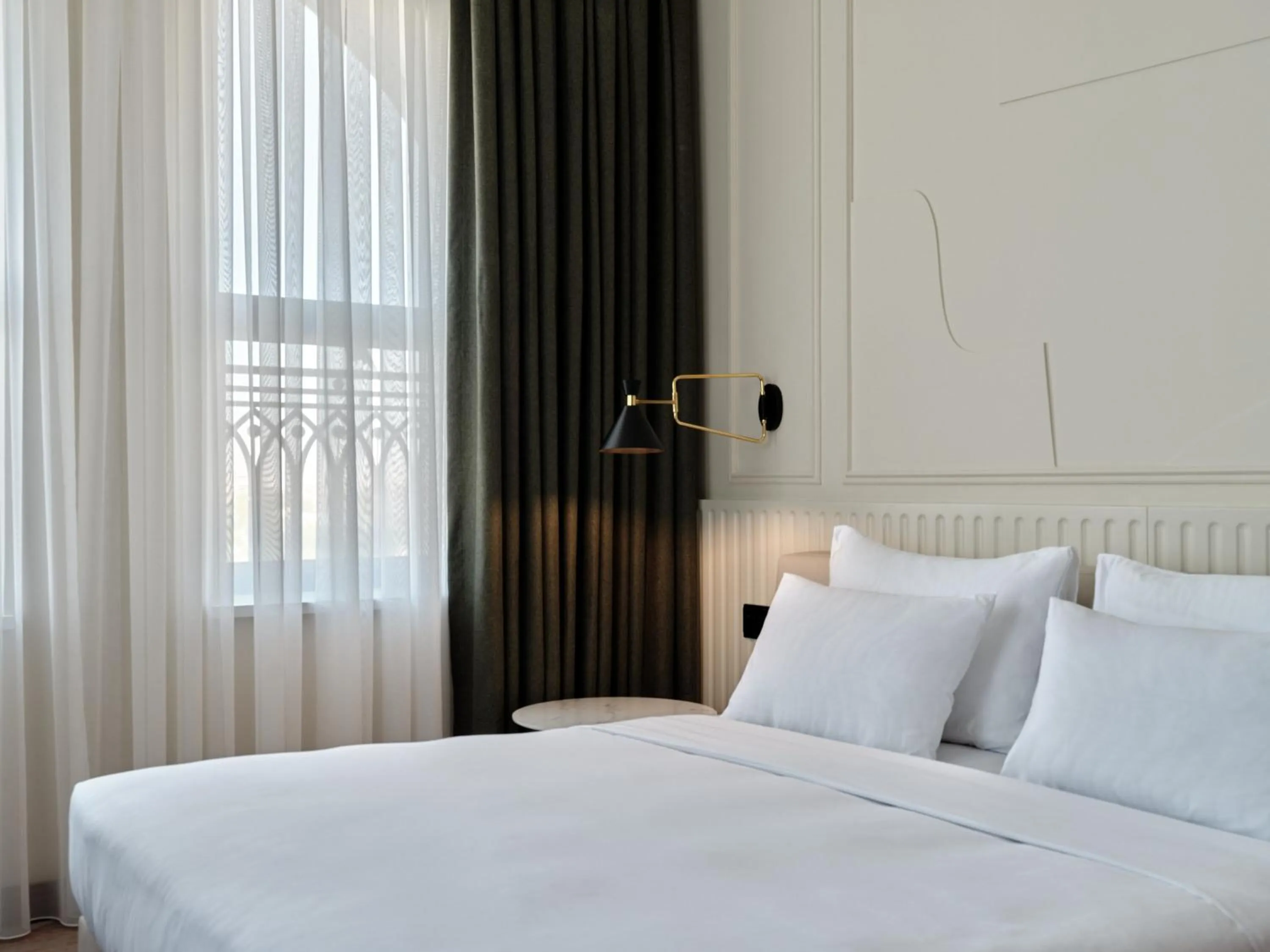 Photo of the whole room, Bed in Crowne Plaza Tashkent, an IHG Hotel