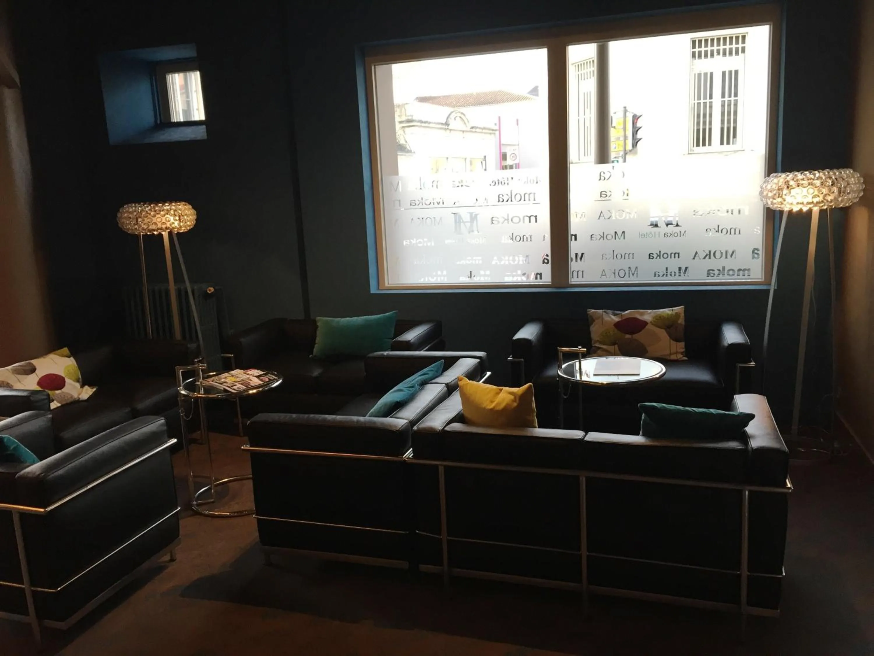 Communal lounge/ TV room in Moka Hotel