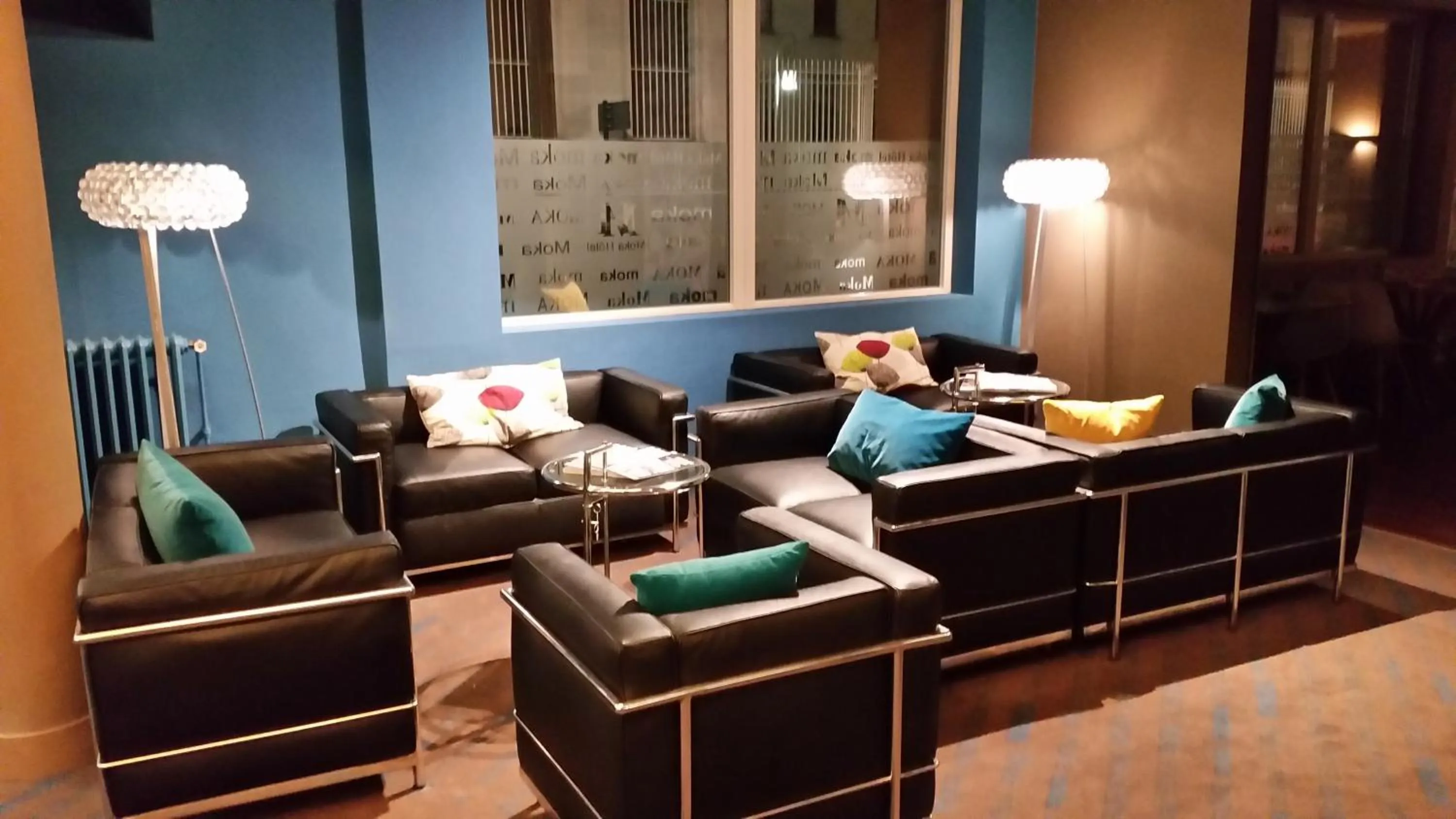 Communal lounge/ TV room in Moka Hotel