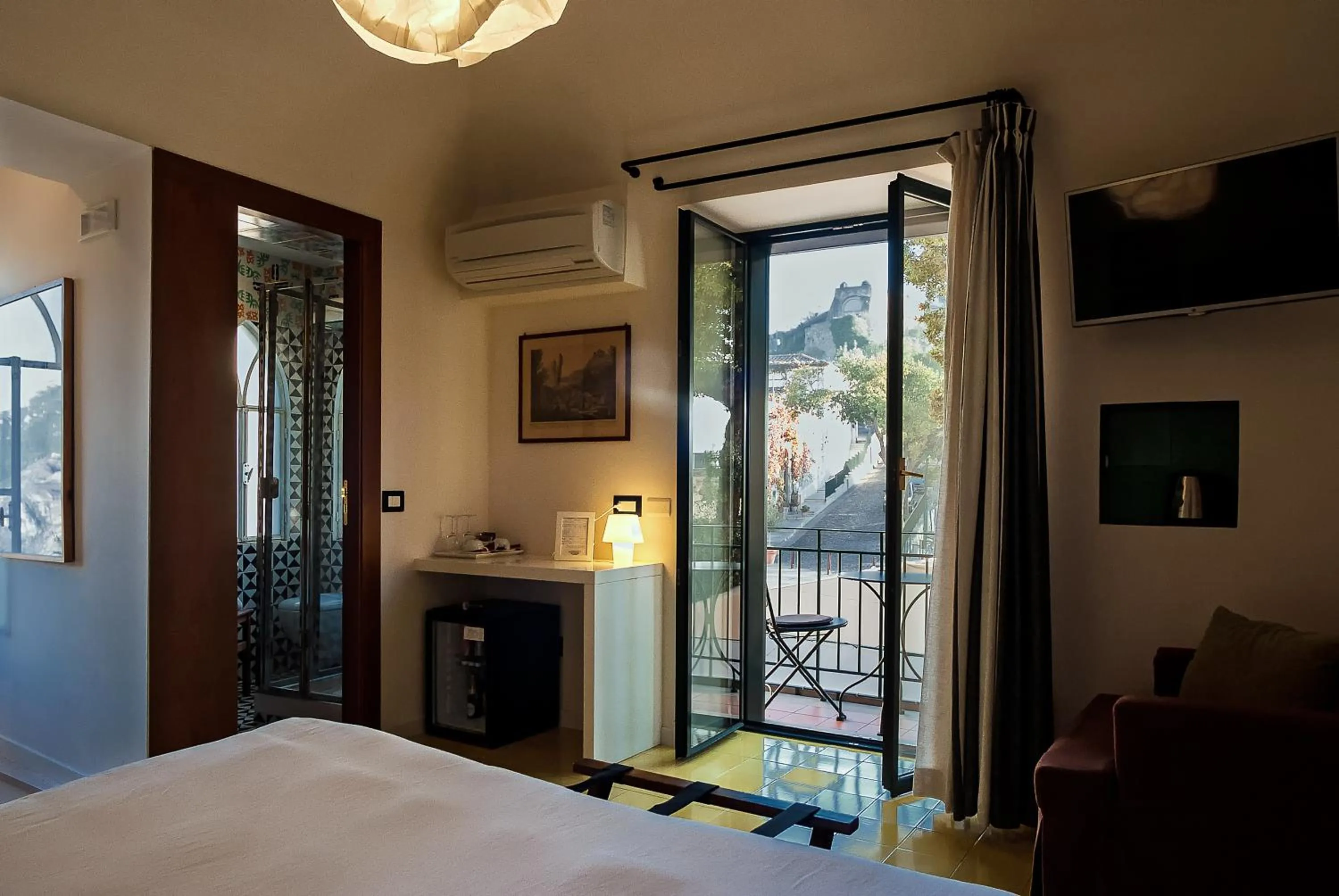 Photo of the whole room, Bed in La Moresca