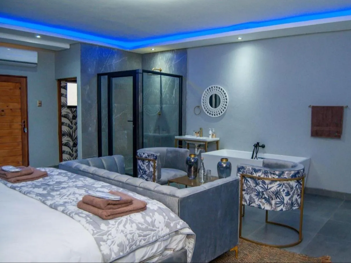 Photo of the whole room, Bed in The Lux Hotel and Resorts