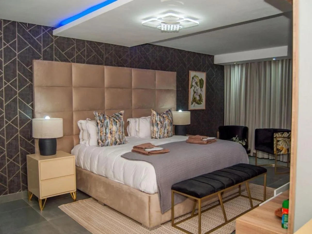 Bed in The Lux Hotel and Resorts