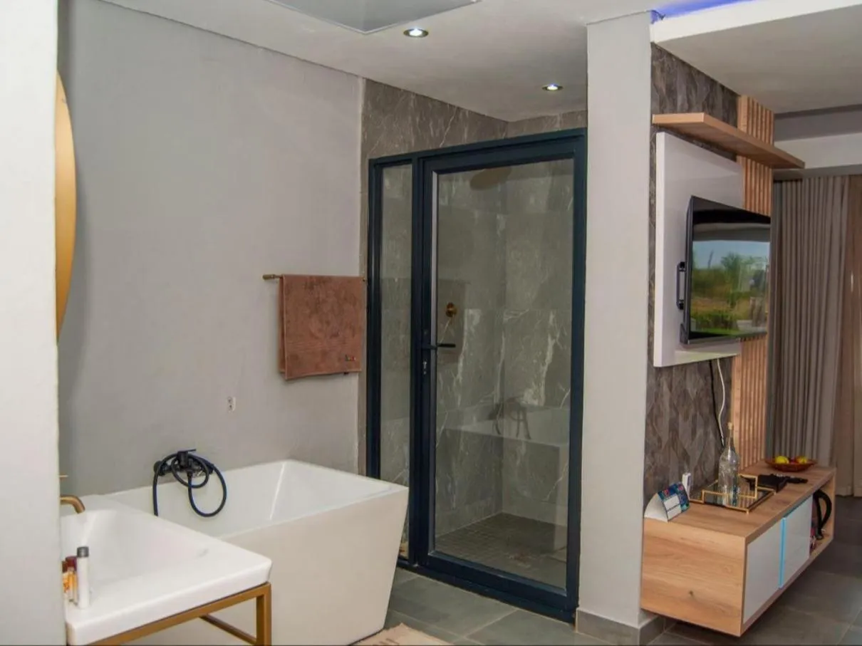 Shower in The Lux Hotel and Resorts