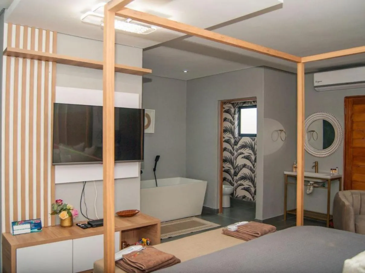 Photo of the whole room, Bed in The Lux Hotel and Resorts