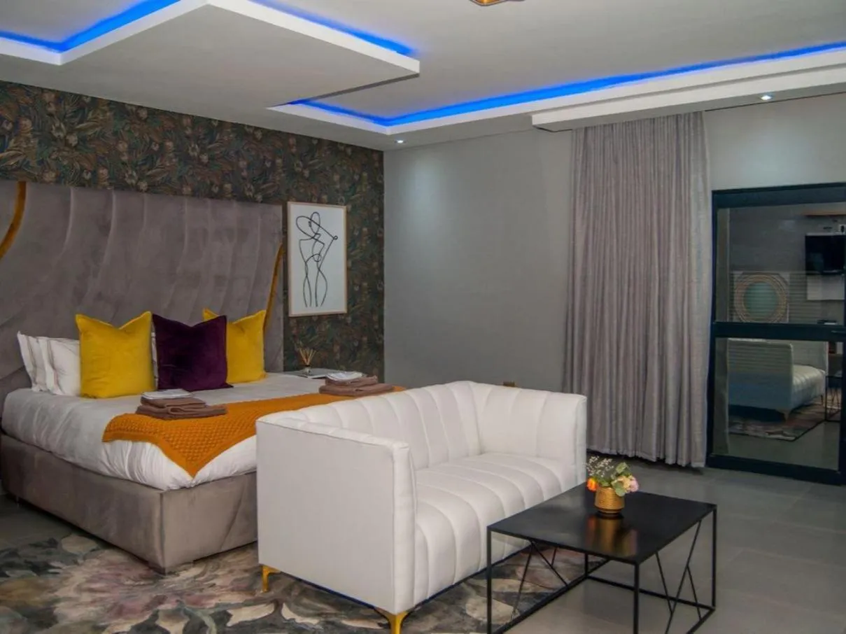 Bed in The Lux Hotel and Resorts