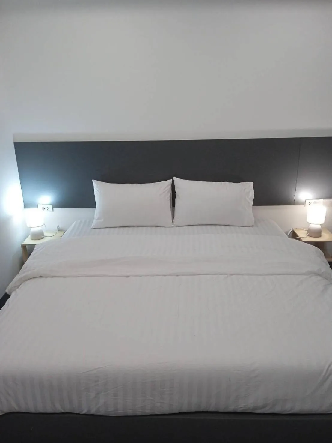 Bed in D Night Suite Hotel