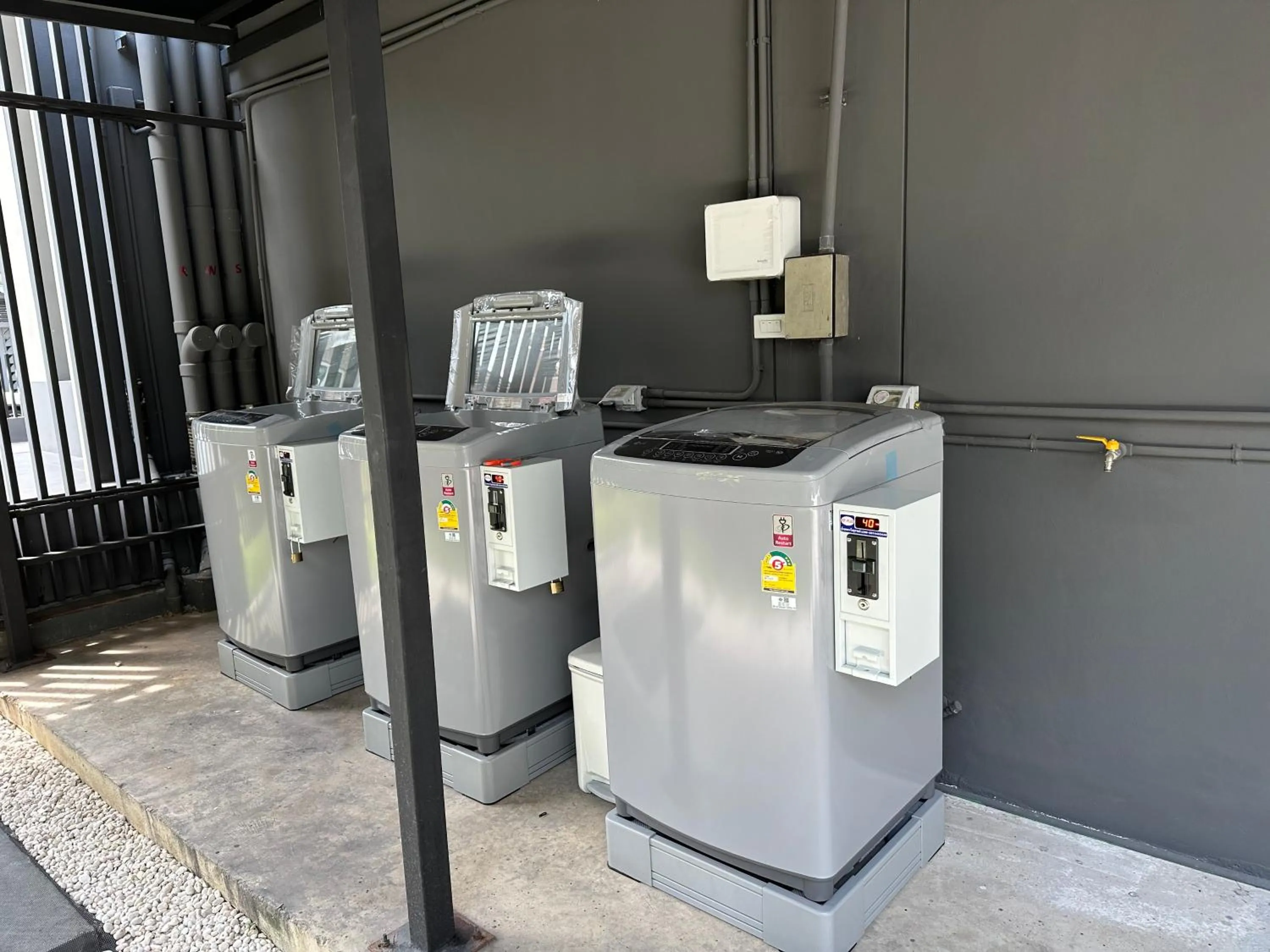 washing machine in D Night Suite Hotel