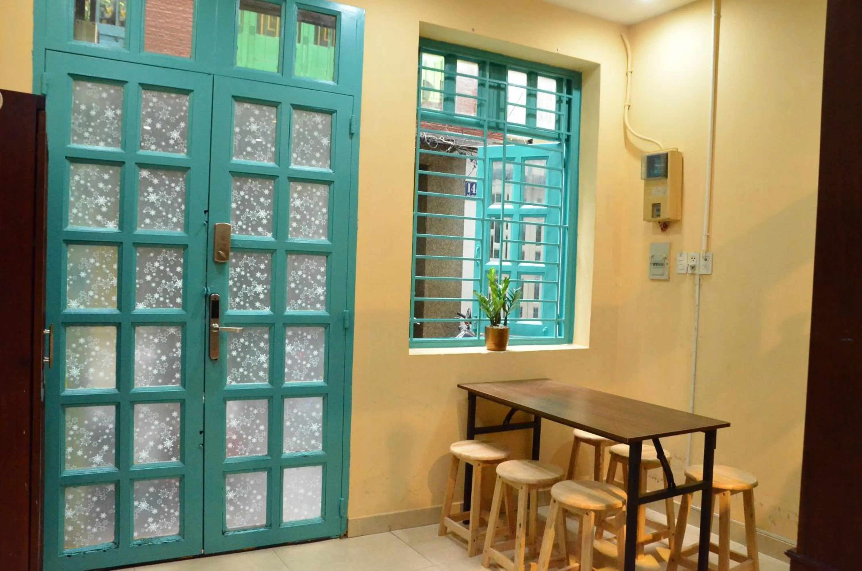 Communal lounge/ TV room in Northern Hostel - Bui Vien Walking Street