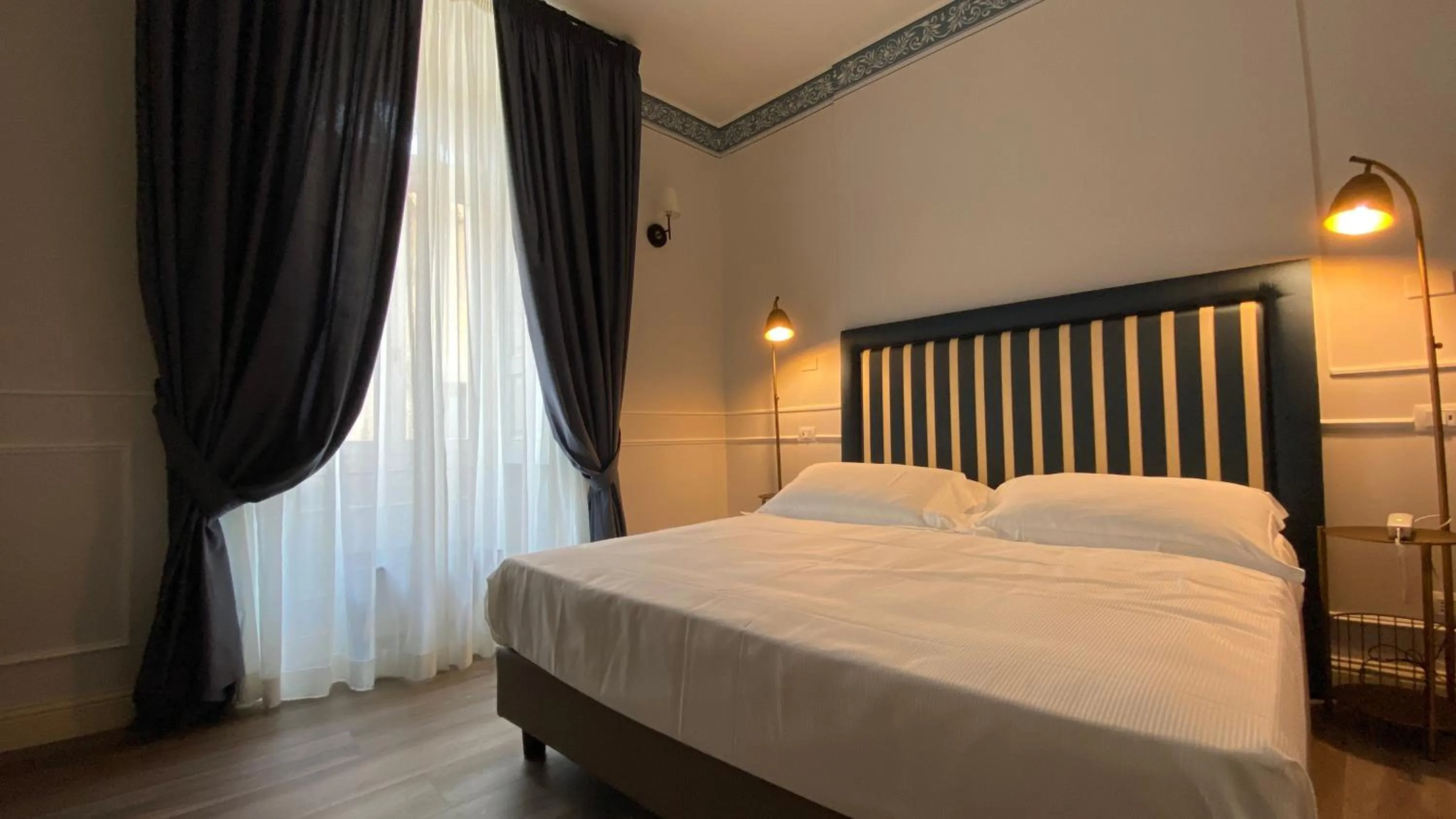 Bed in Lanterne Magiche Ortigia Suites