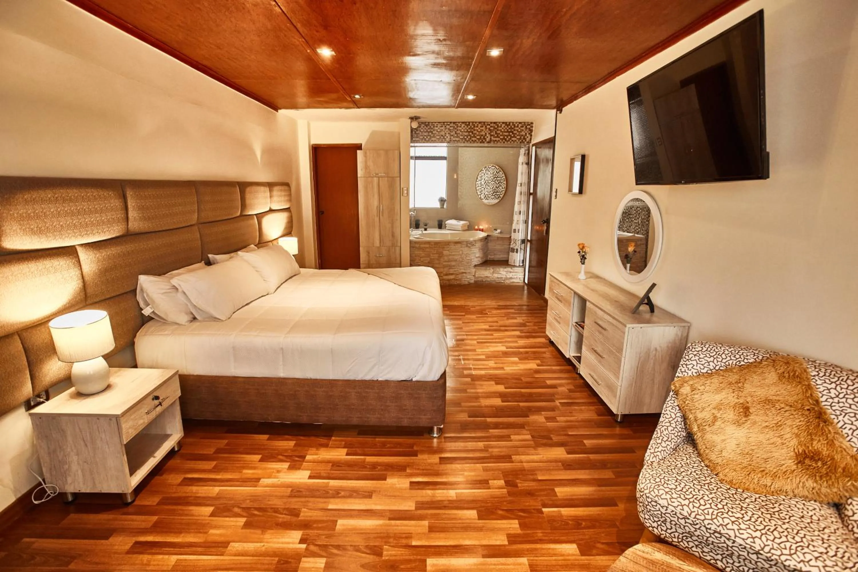 Bed in Inti Tampu Inn