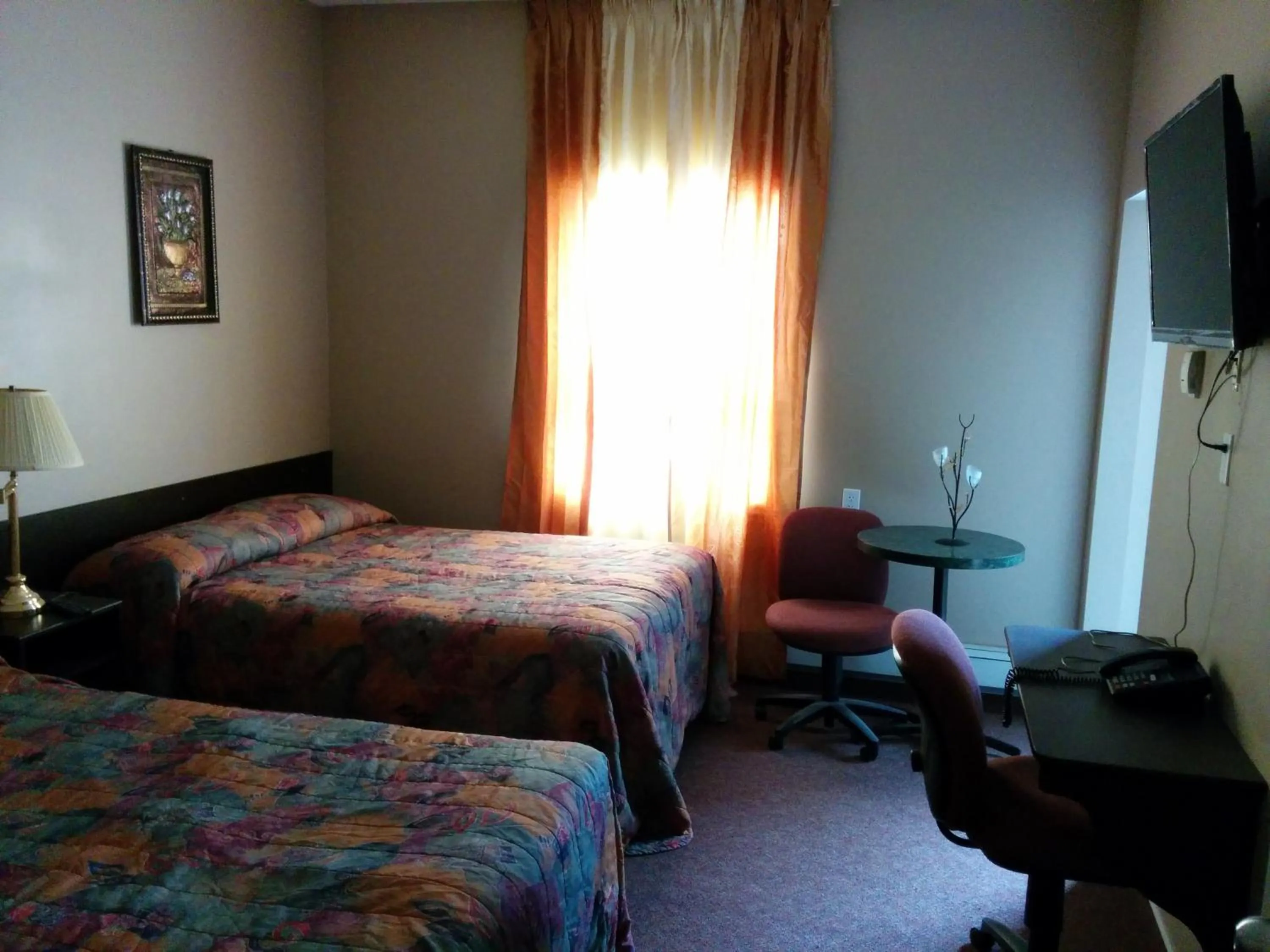 Bed in Bonnyville Hotel