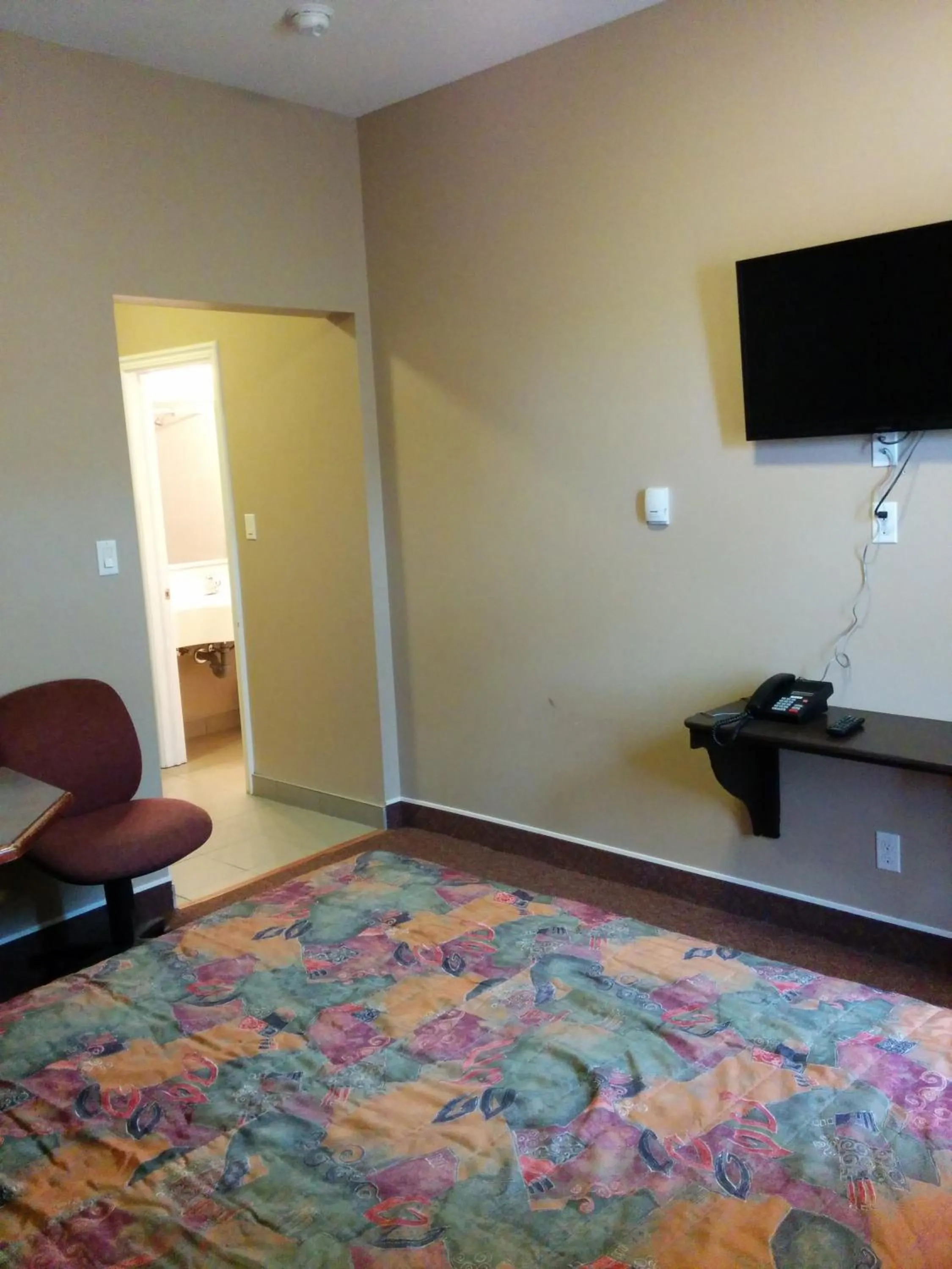 Bed in Bonnyville Hotel