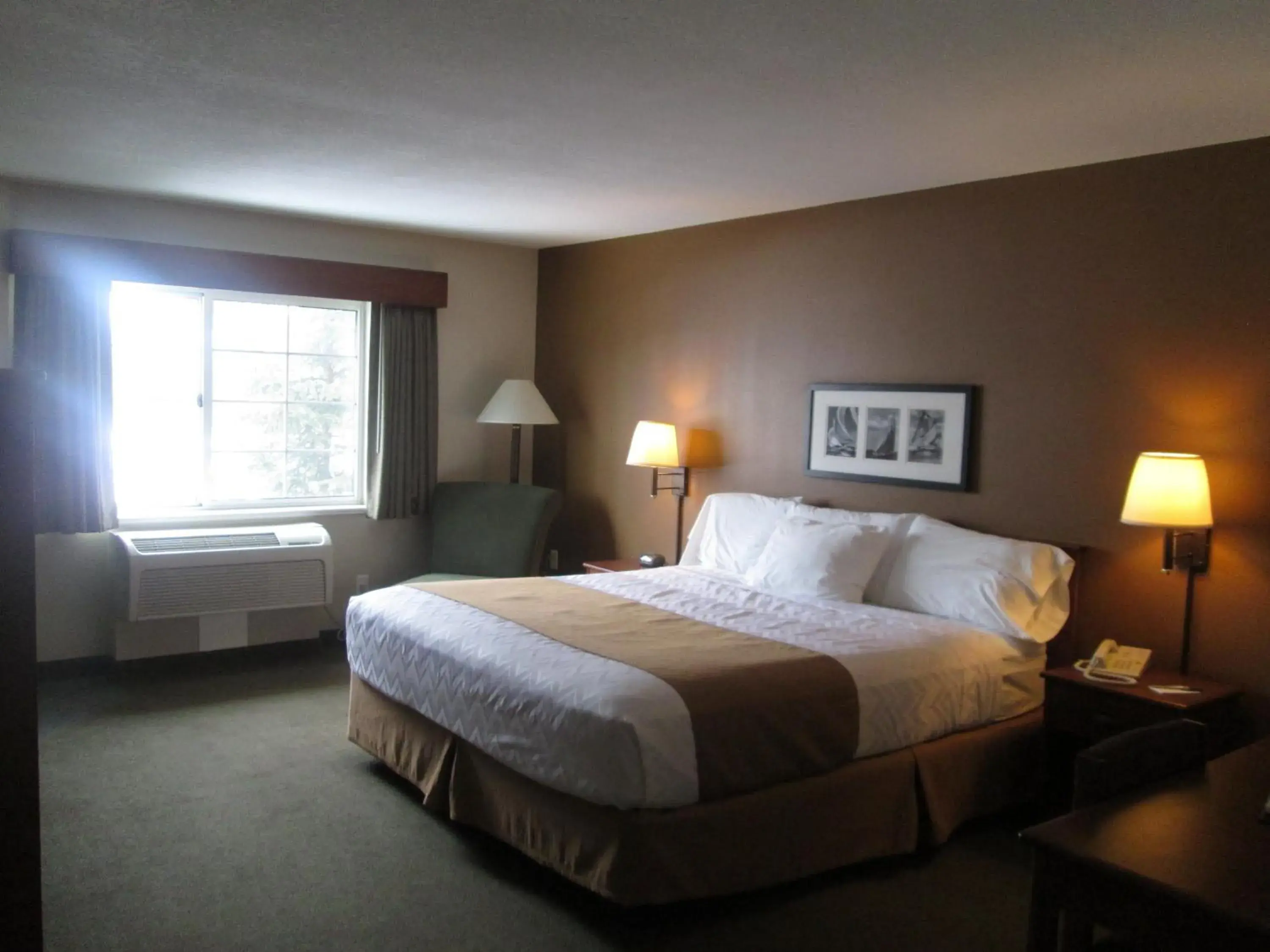 Bed in AmericInn by Wyndham Charlevoix Bed in AmericInn by Wyndham Charlevoix