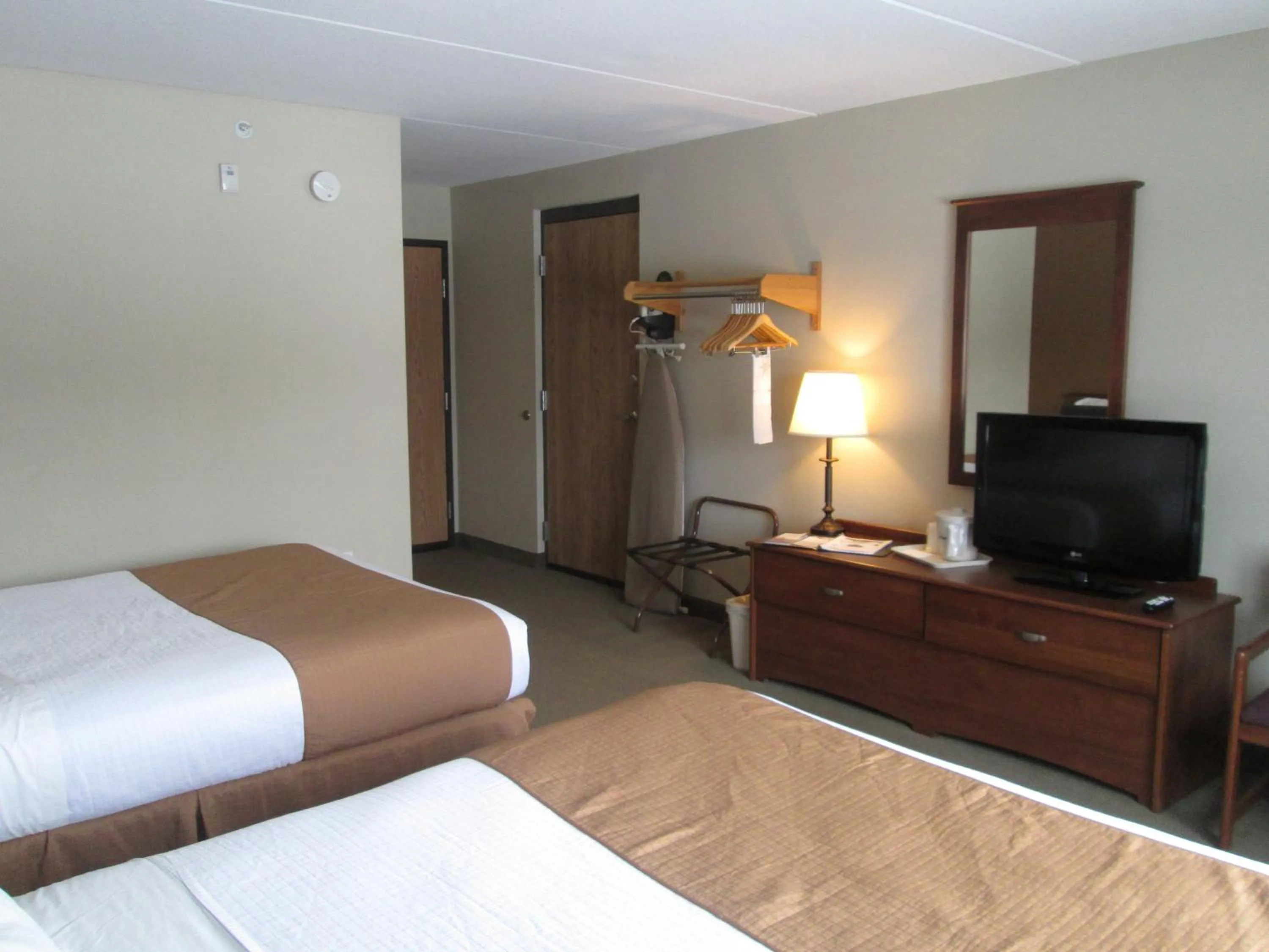 Photo of the whole room, Bed in AmericInn by Wyndham Charlevoix