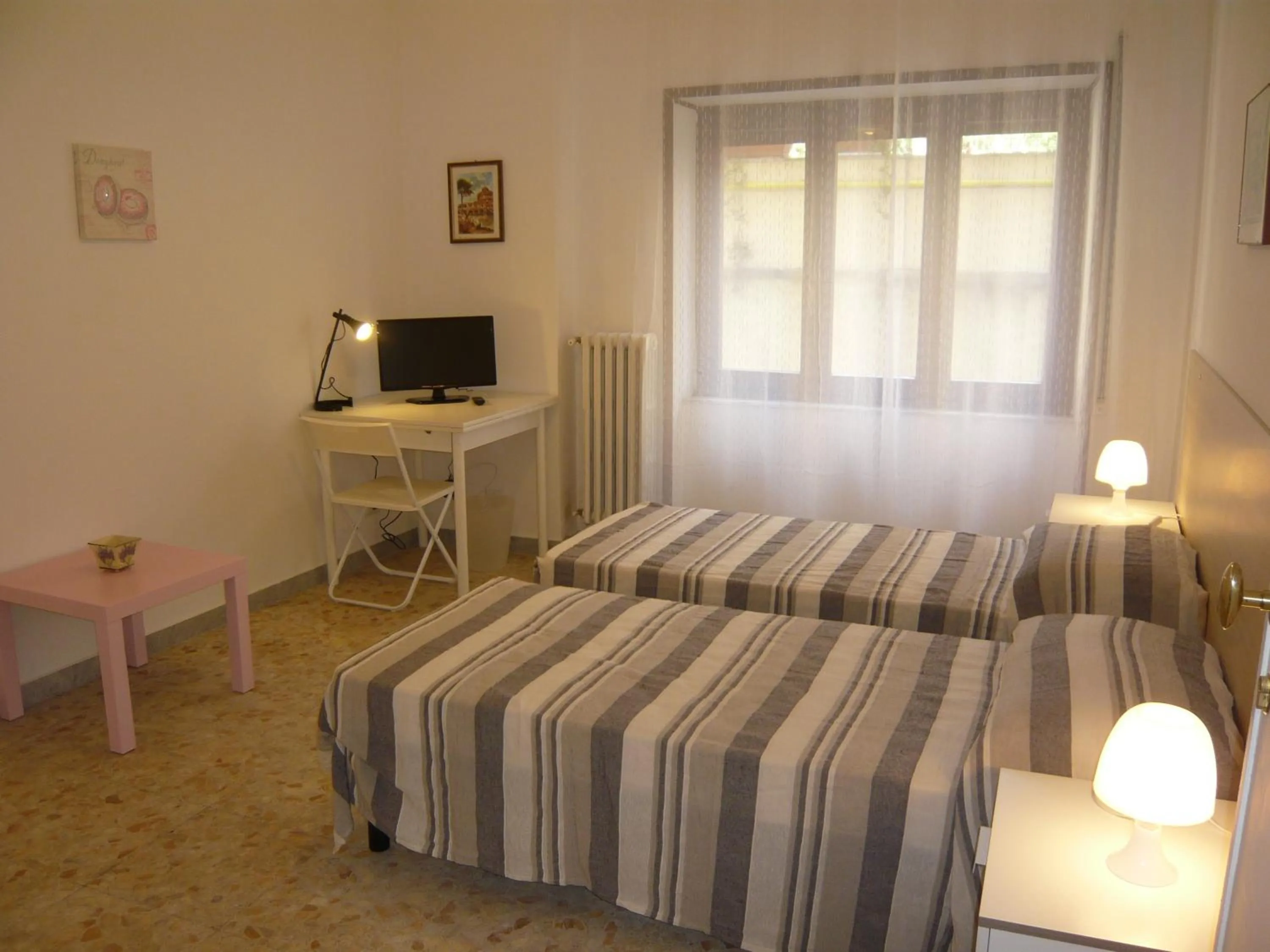 Photo of the whole room, Bed in Residenza Flaminia