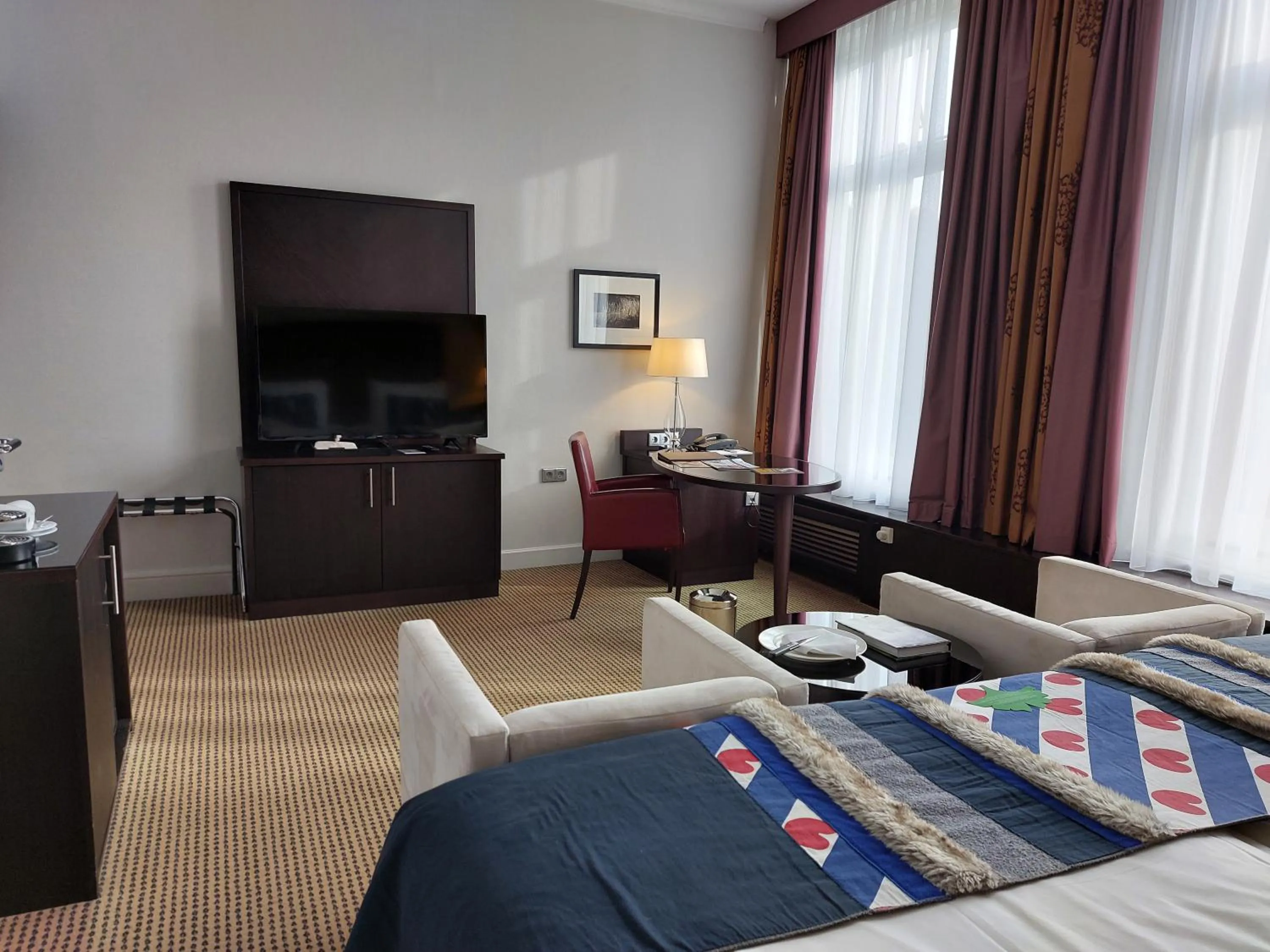 Communal lounge/ TV room, Bed in Landgoed Lauswolt