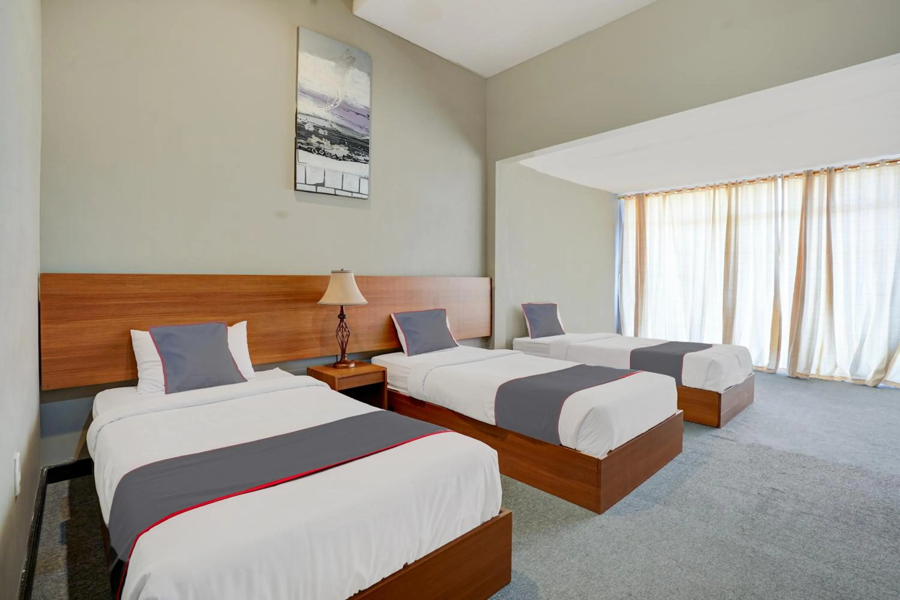 Bed in Collection O Padang near Mesjid Raya Syekh Ahmad Al-Minangkabawi formerly Hotel Surya Palace