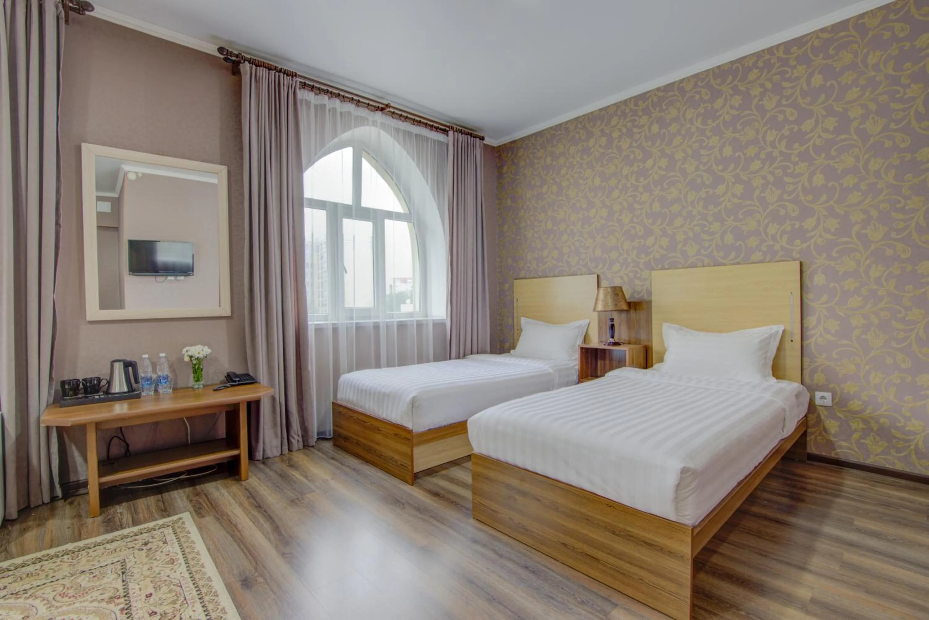 Bed in Shah Palace Hotel