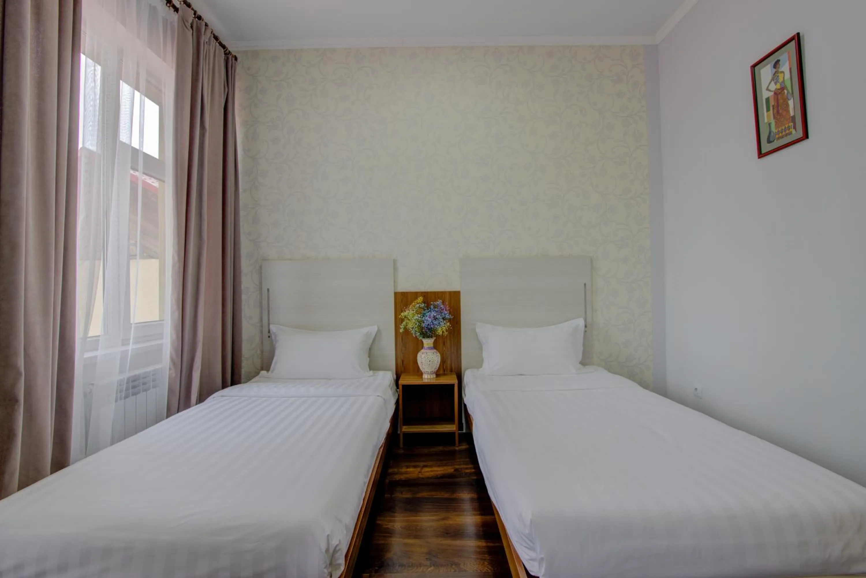 Bed in Shah Palace Hotel