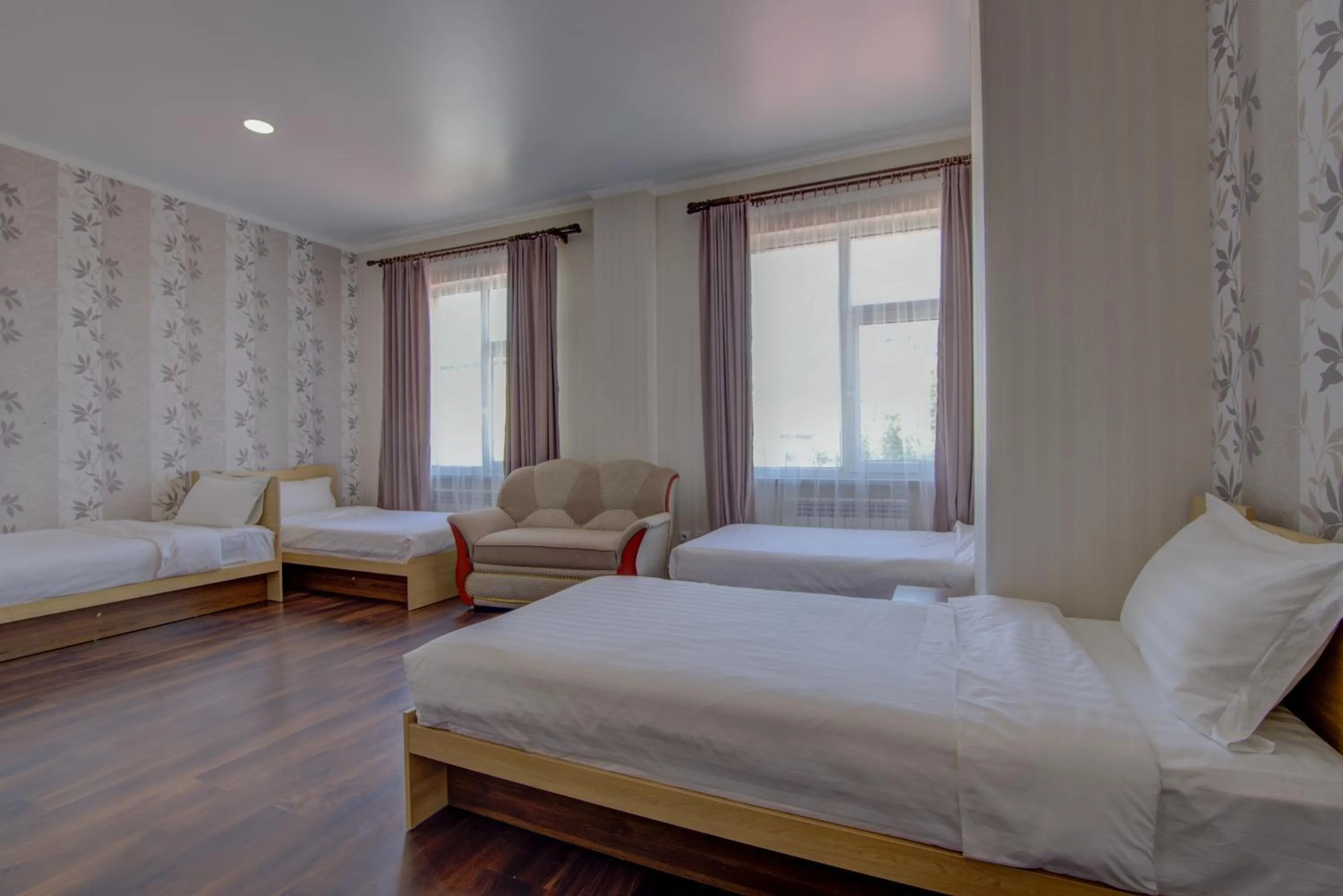 Bed in Shah Palace Hotel