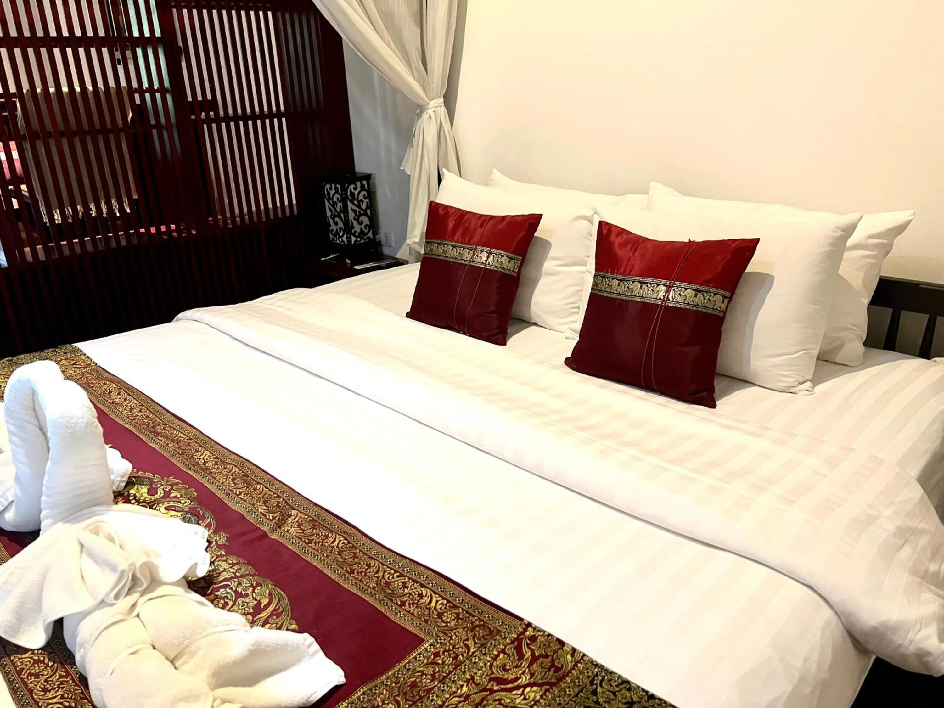 Bedroom in Meuangluang Hotel