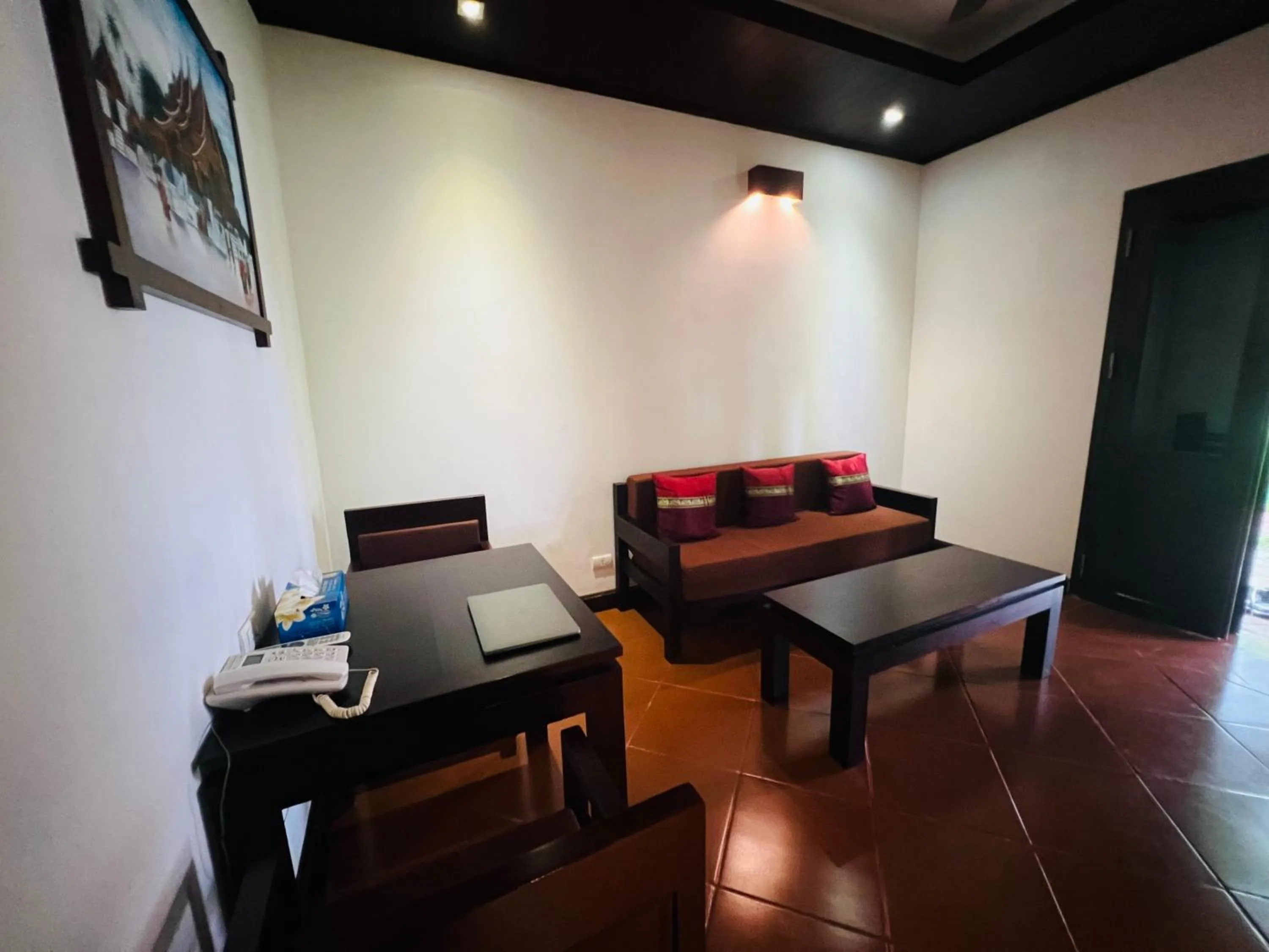 Living room in Meuangluang Hotel