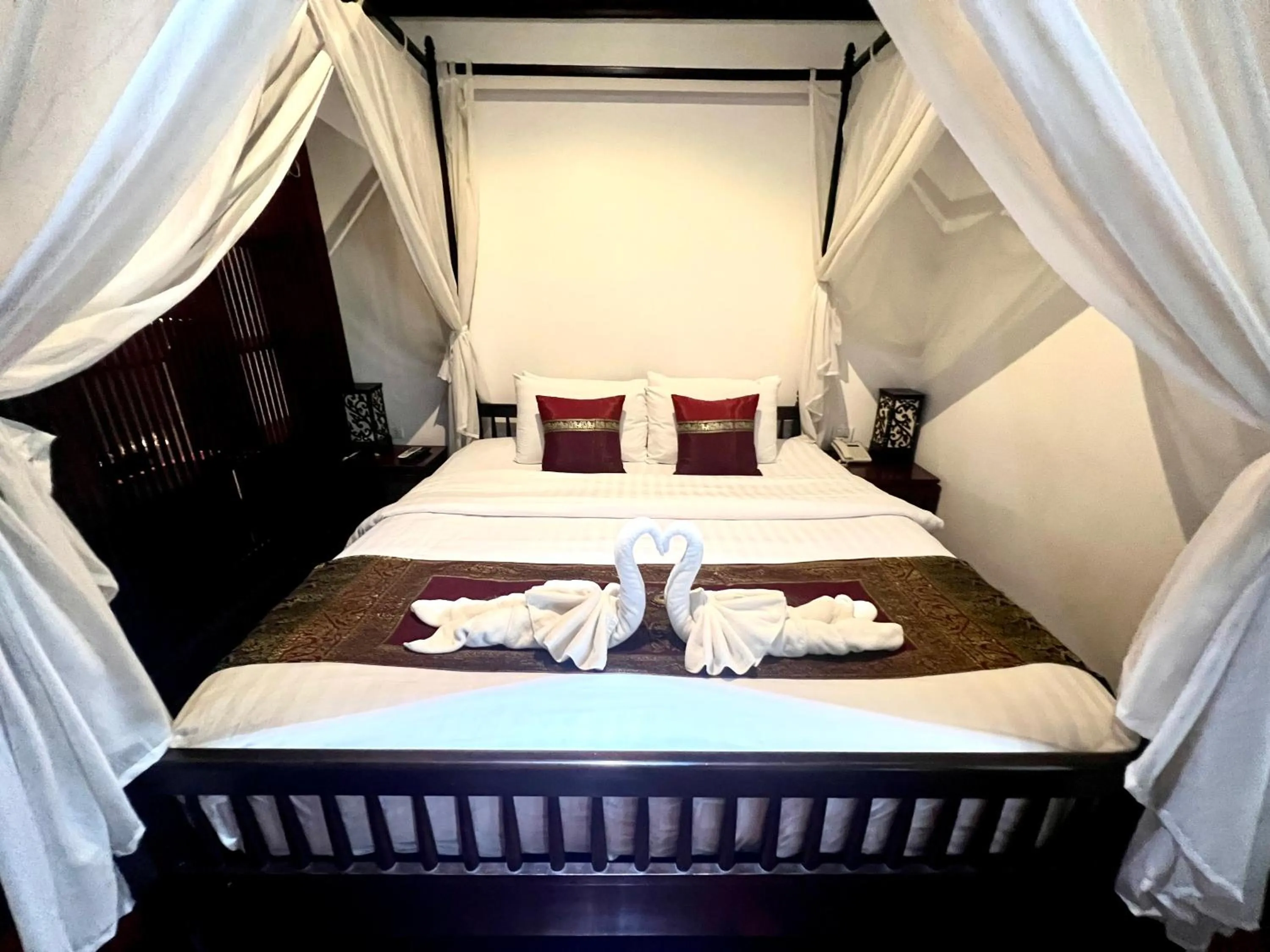 Bedroom in Meuangluang Hotel