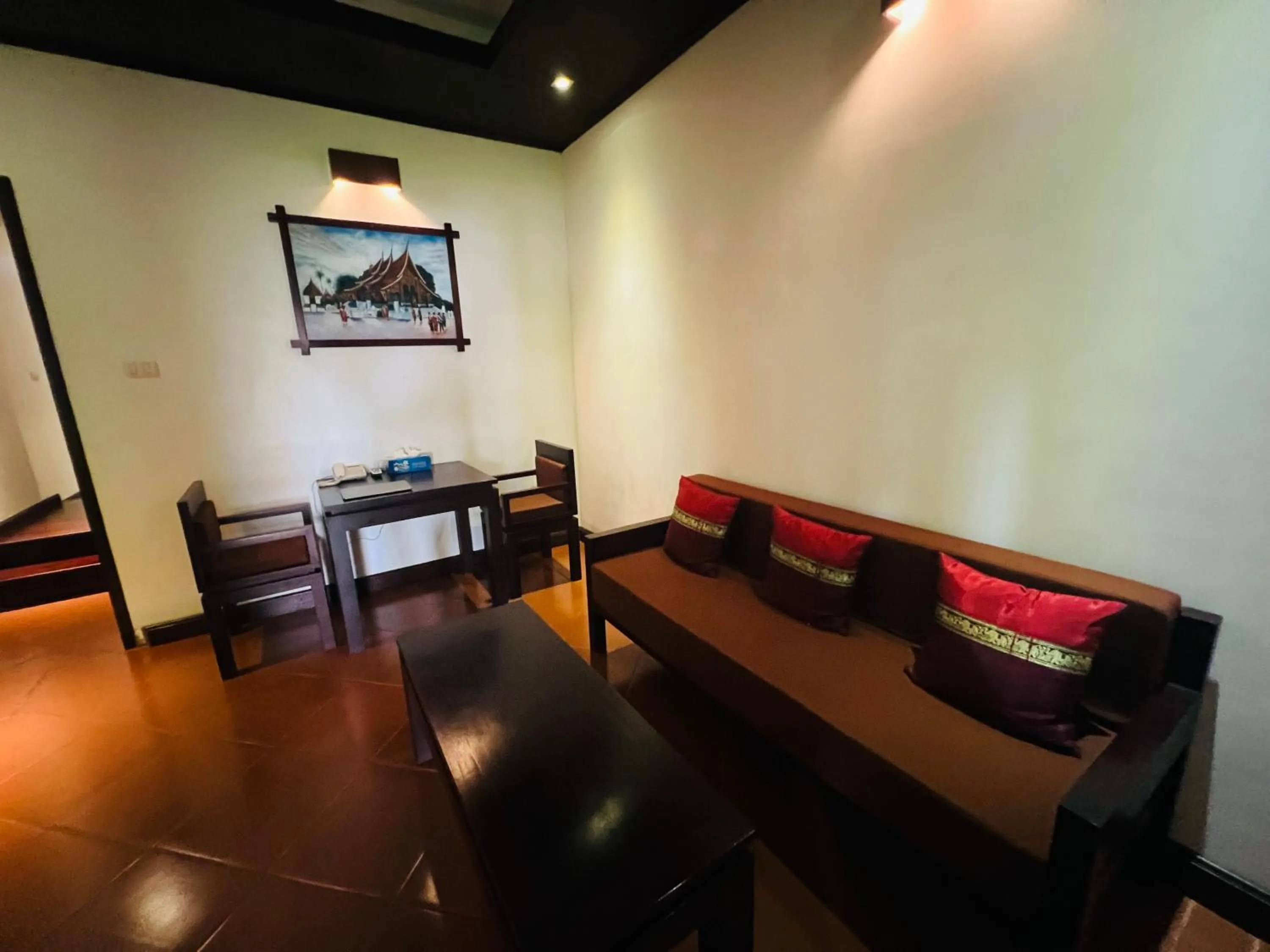 Living room in Meuangluang Hotel