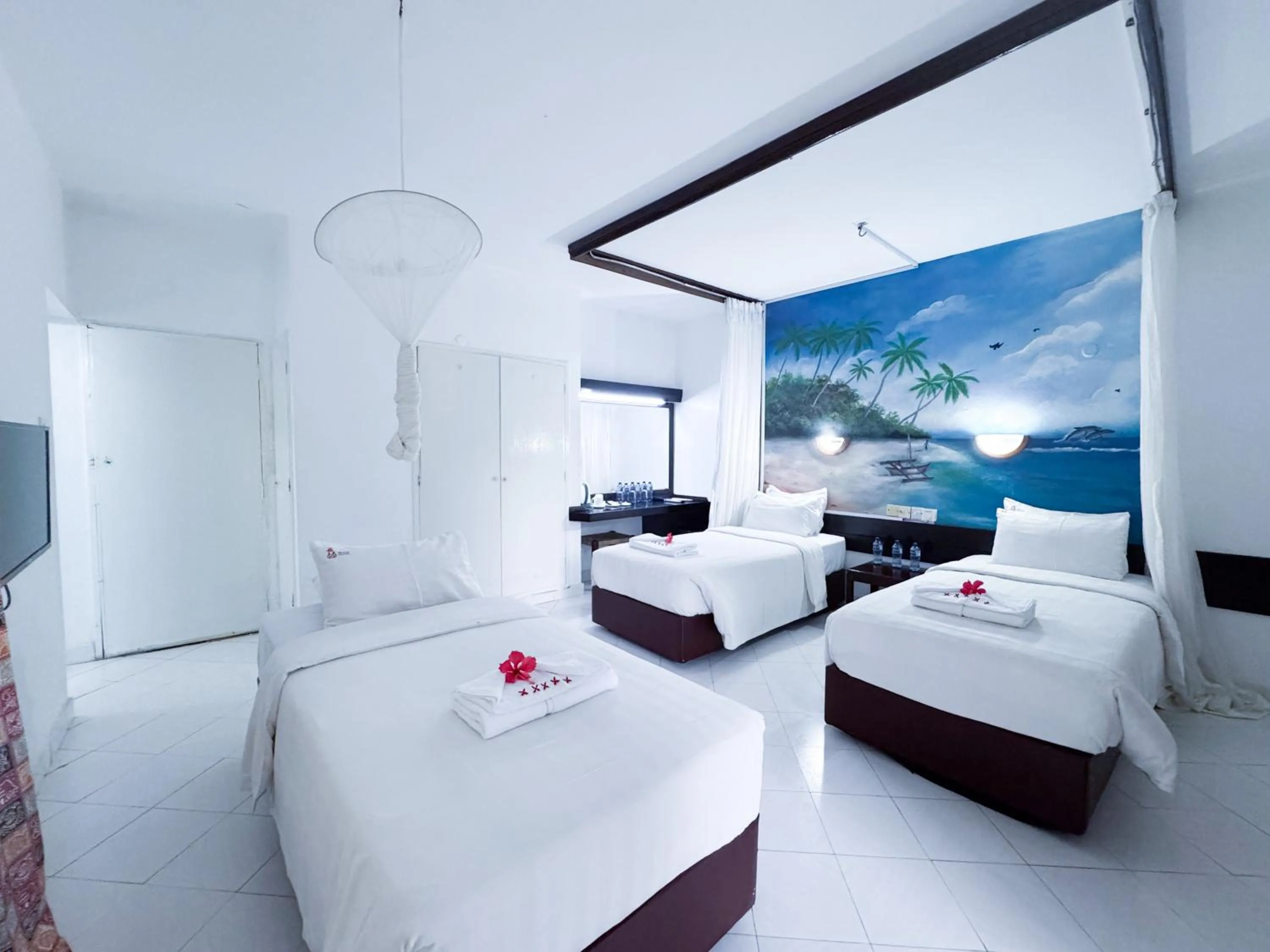 Bed in Milele Beach Hotel