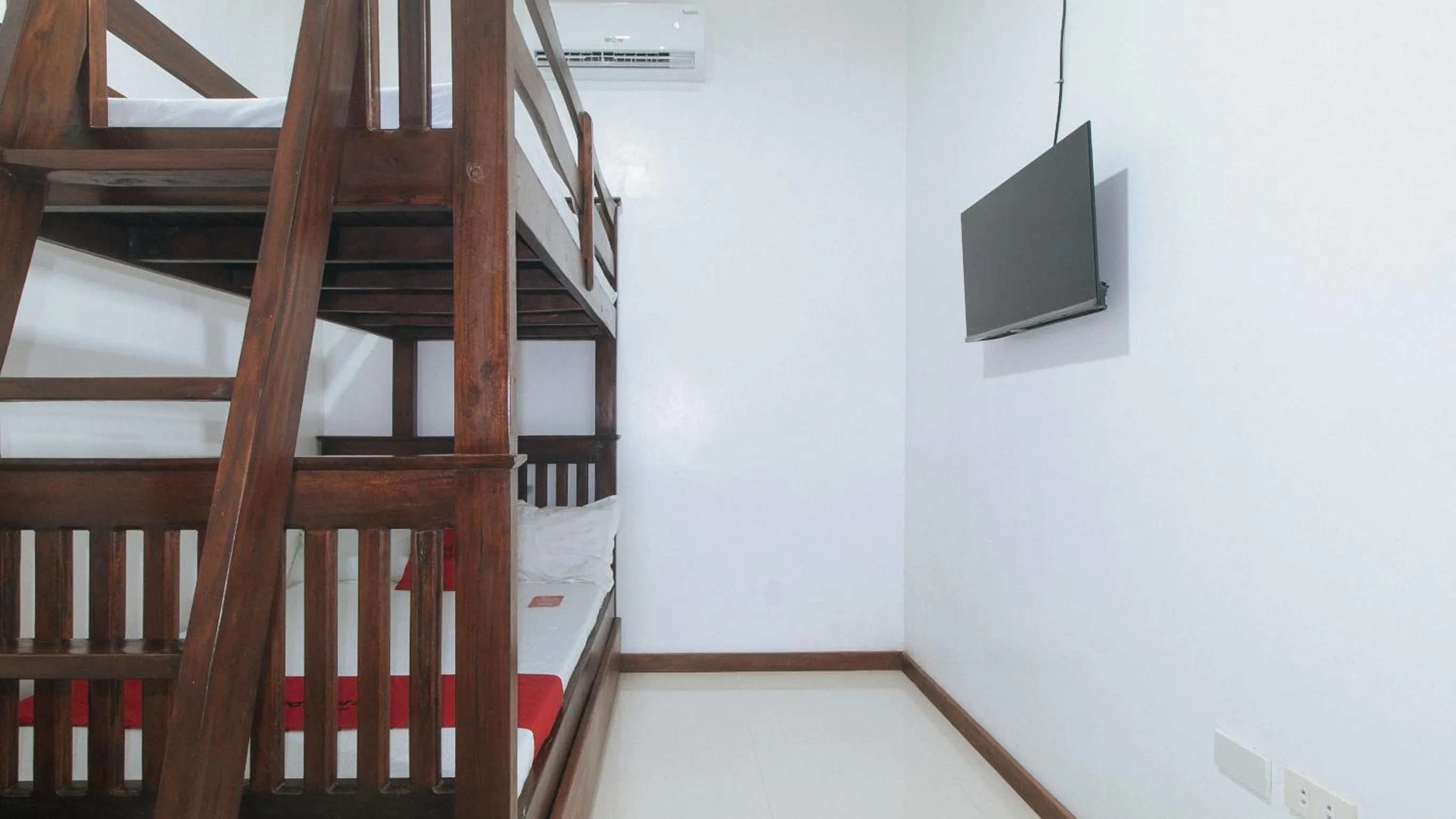 Bedroom in RedDoorz at Casa Rafaelle Transient Ilocos Sur
