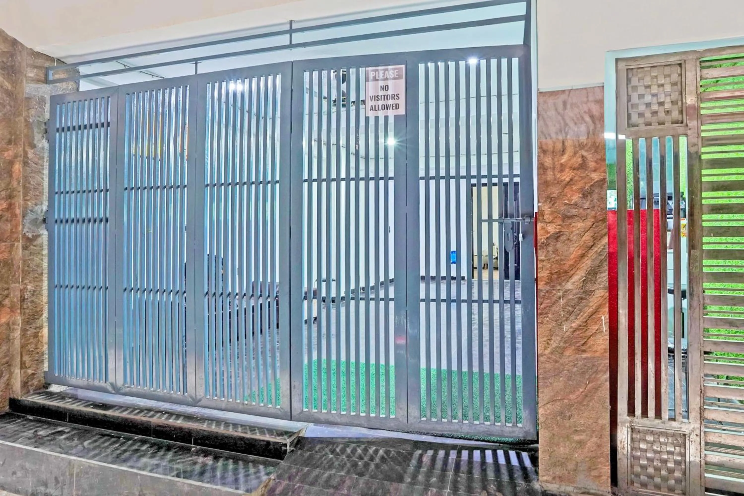 Facade/entrance in Super Hotel O Twamev Residency