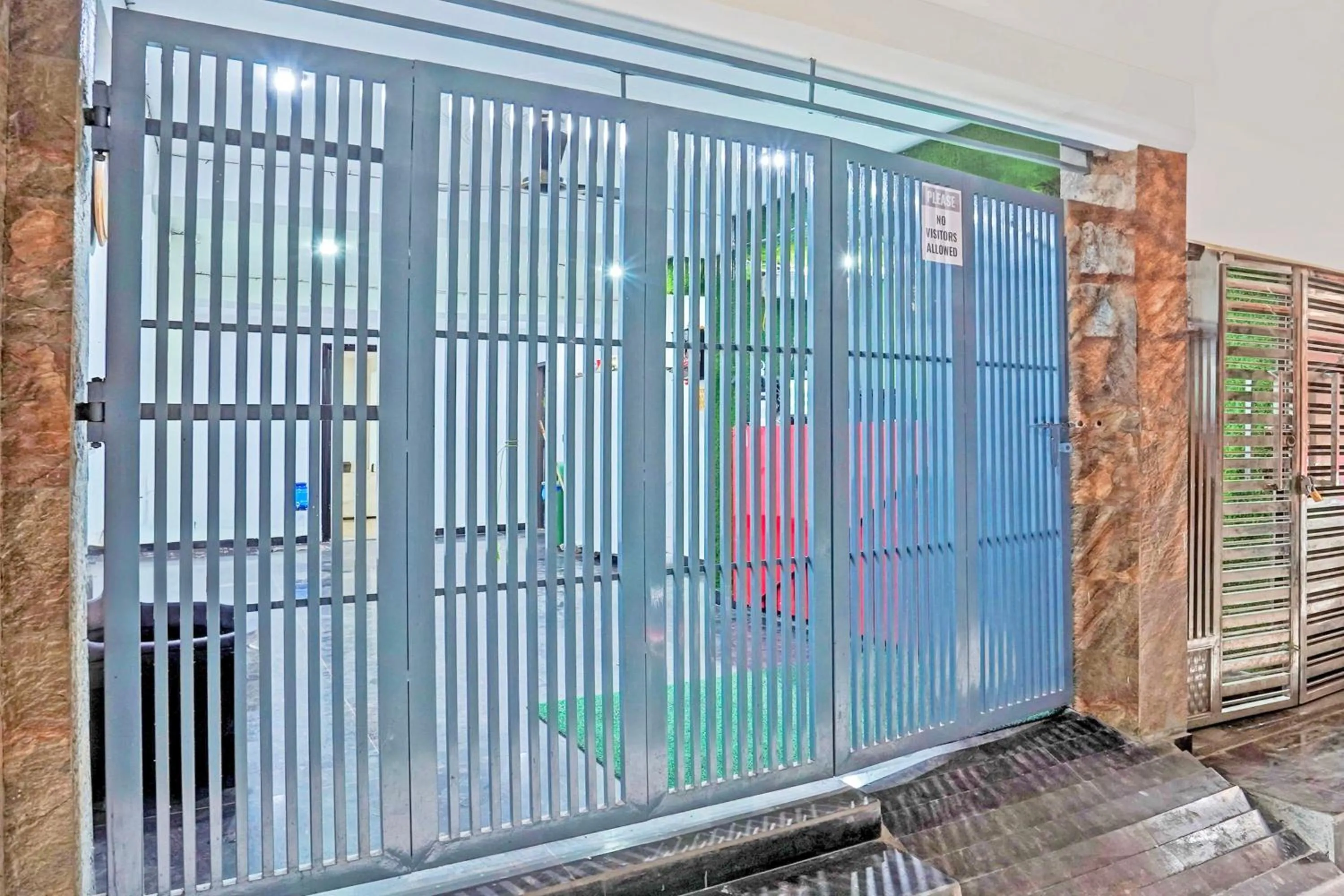 Facade/entrance in Super Hotel O Twamev Residency