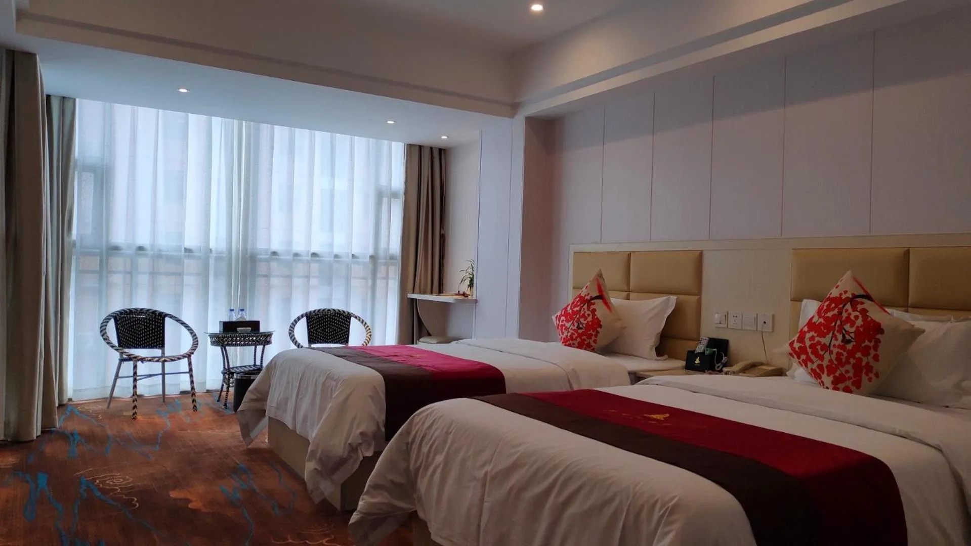 Bed in Century Hotel Tongren