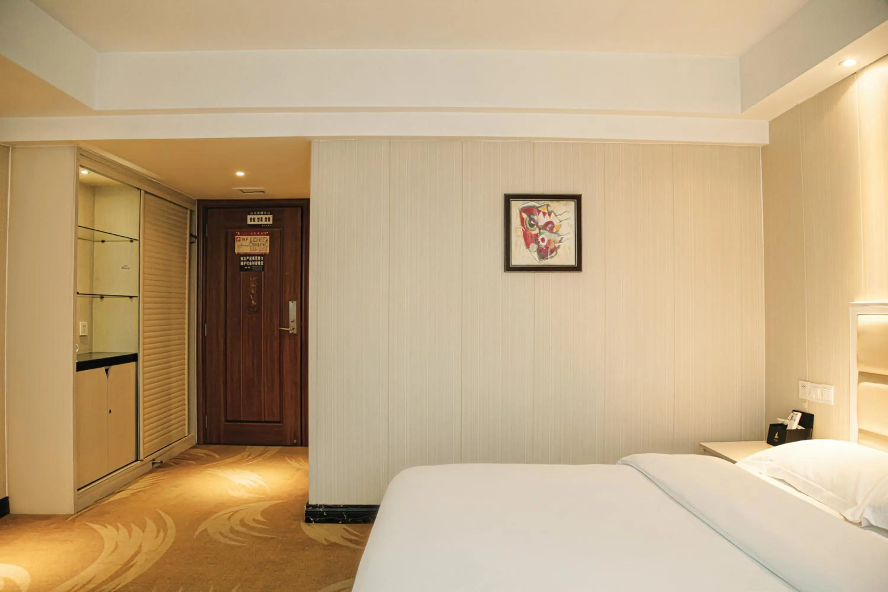 wardrobe, Bed in Century Hotel Tongren