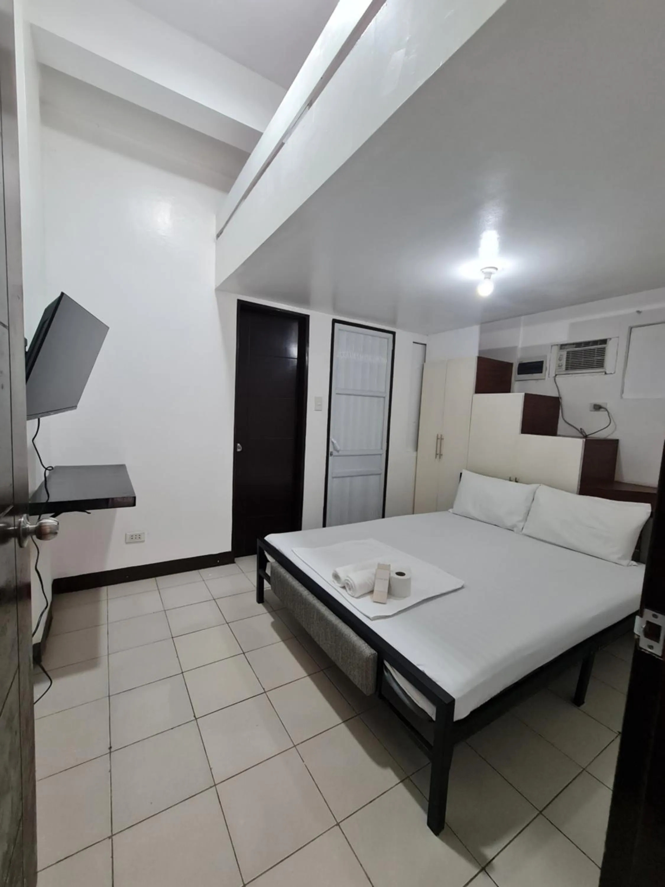 Bed in Dasma Lofts Hotel near Dela Salle Dasma