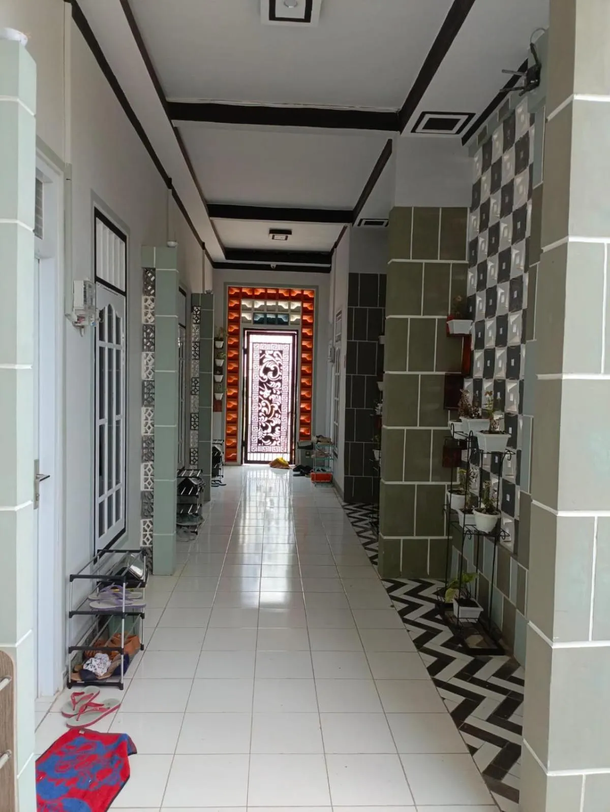 Text overlay in JN Kost Eksklusif Kost Purwokerto