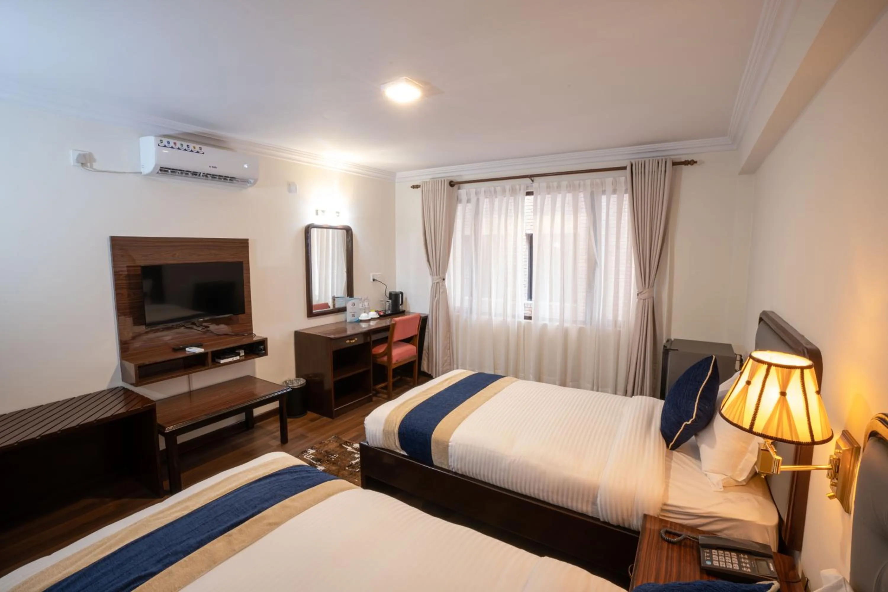 Bed in Kathmandu Business Hotel