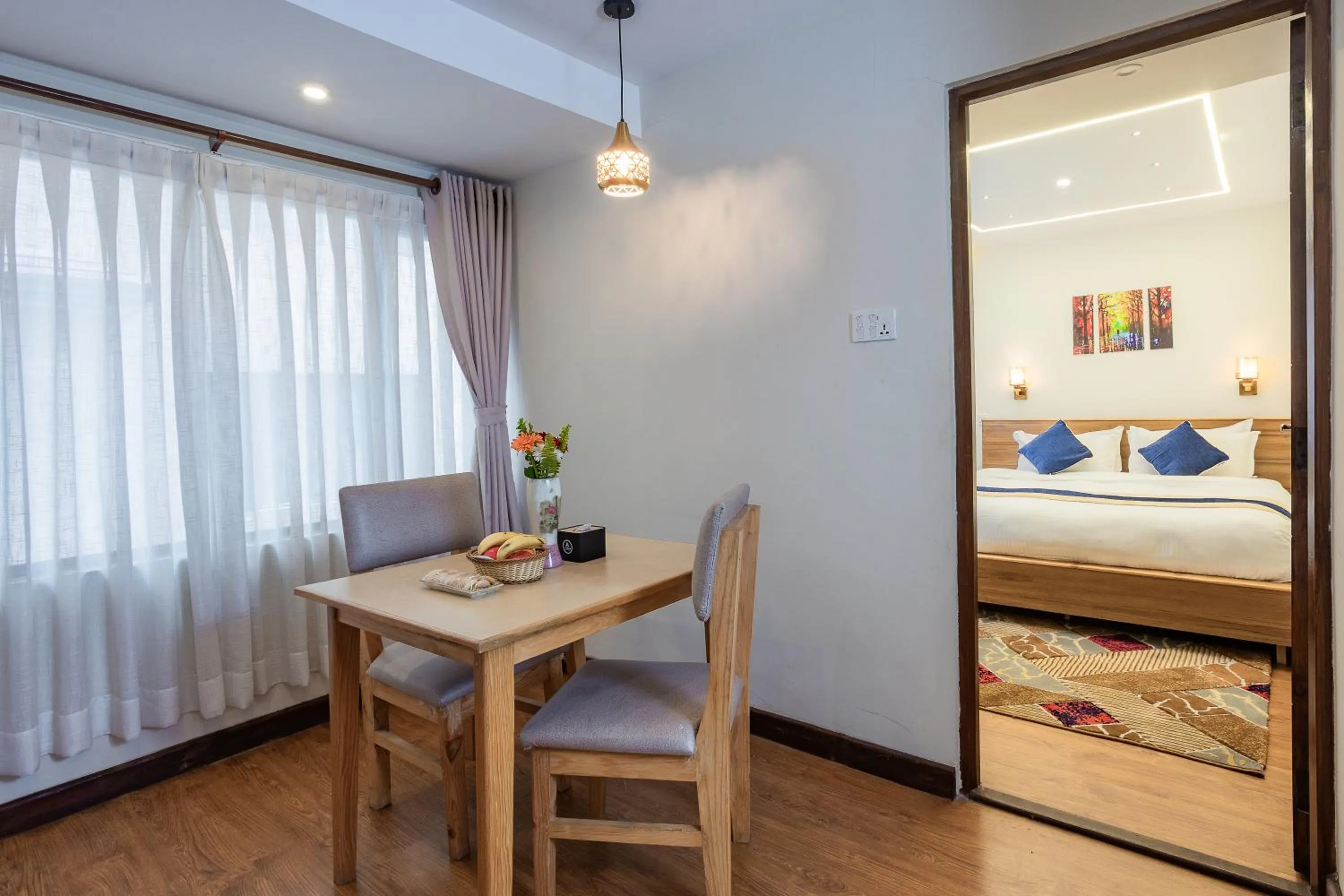 Dining area, Bed in Kathmandu Business Hotel