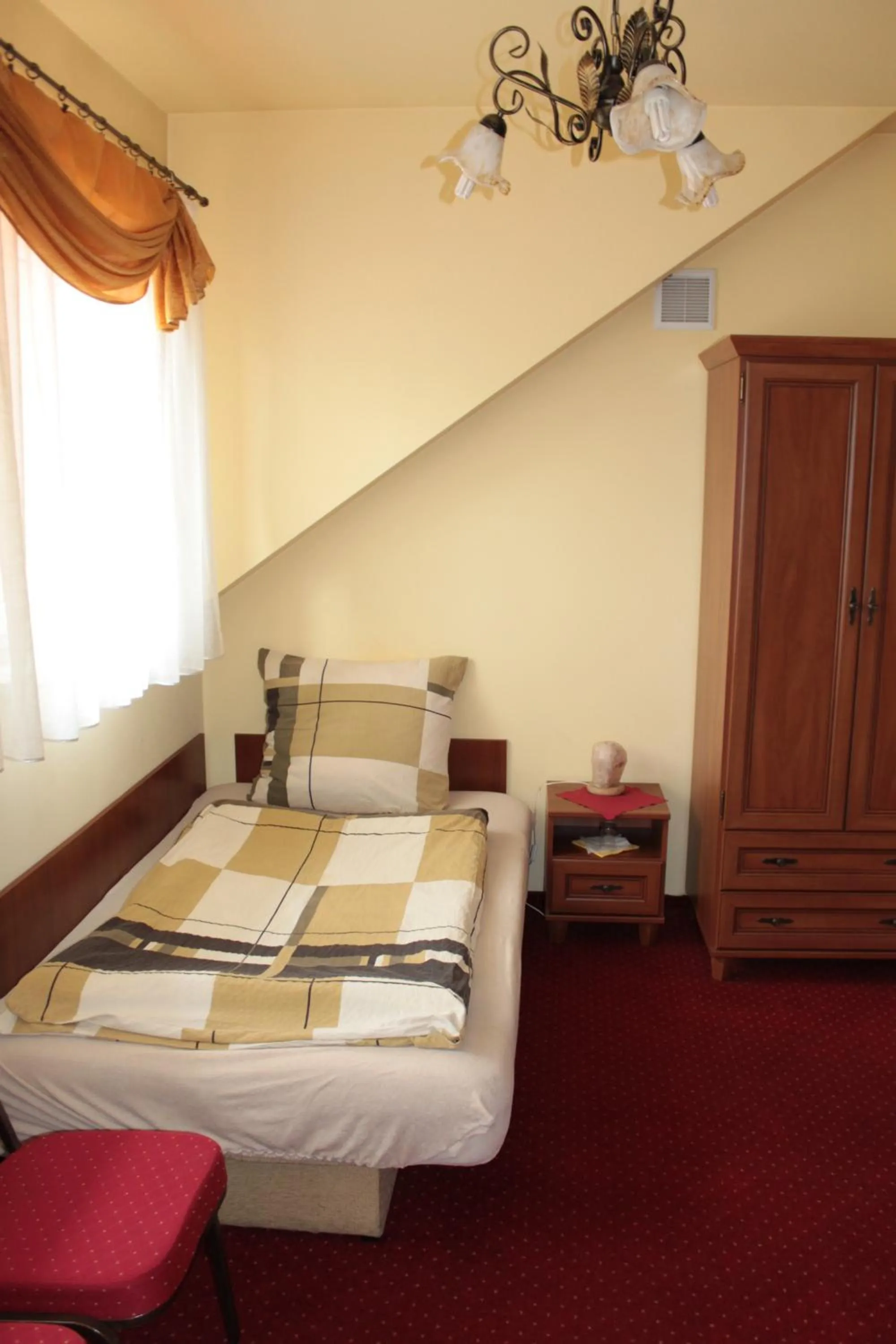 Bed in Zajazd Skorpion B&B