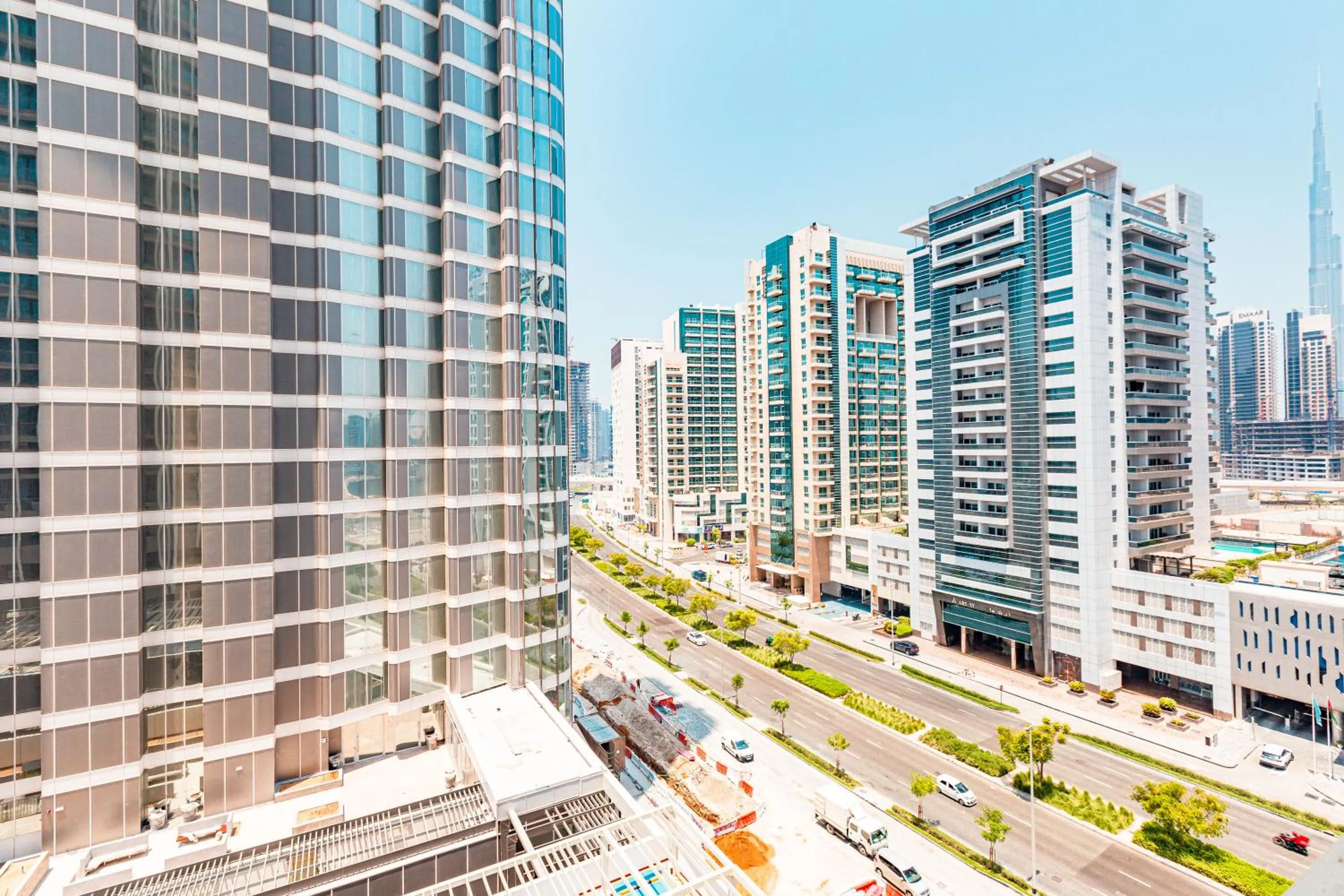 City view in Waves Holiday Homes - Chic Studio With Balcony Overlooking City Views