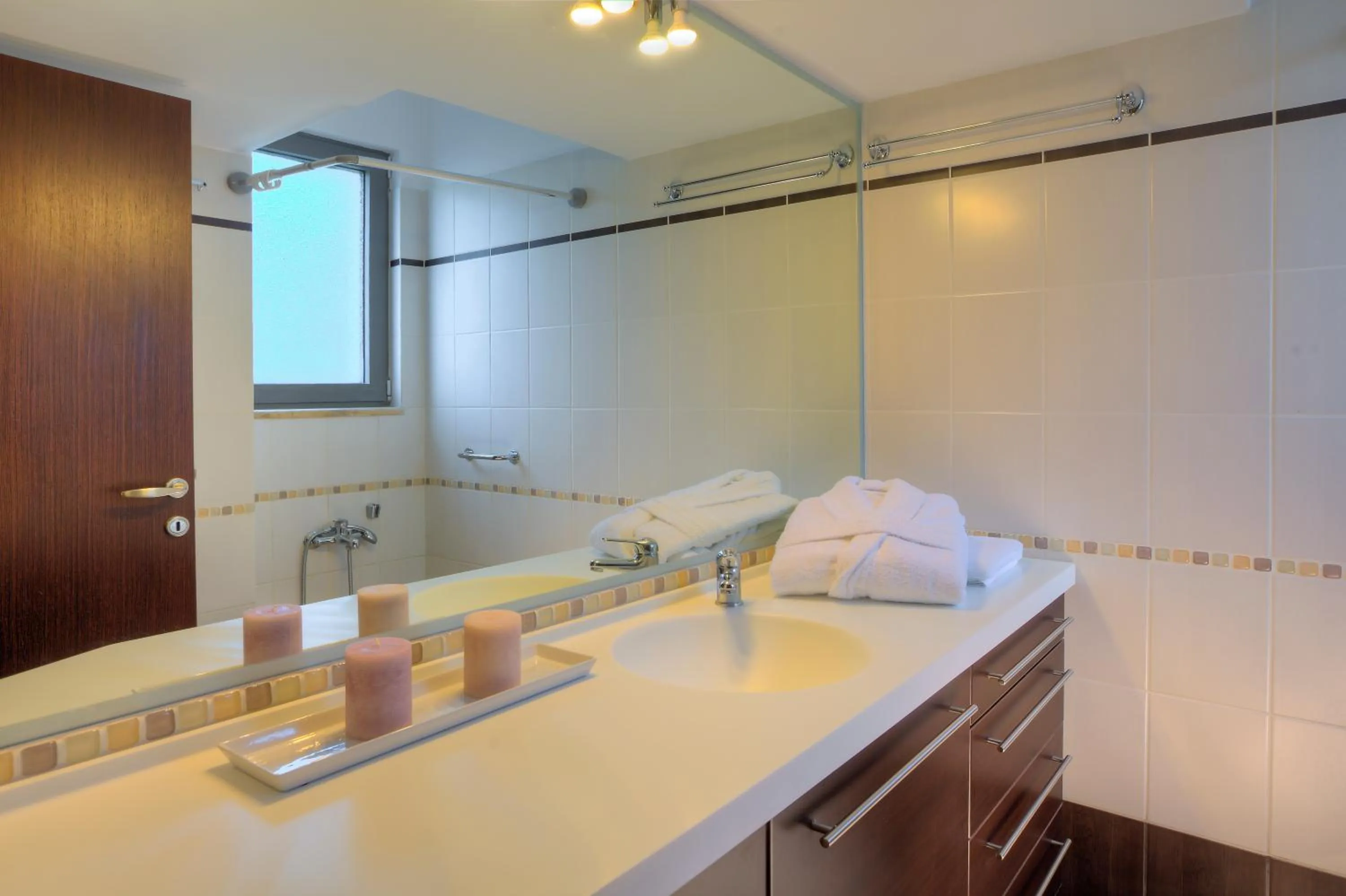 Bathroom in Marini Luxury Apartments and Suites
